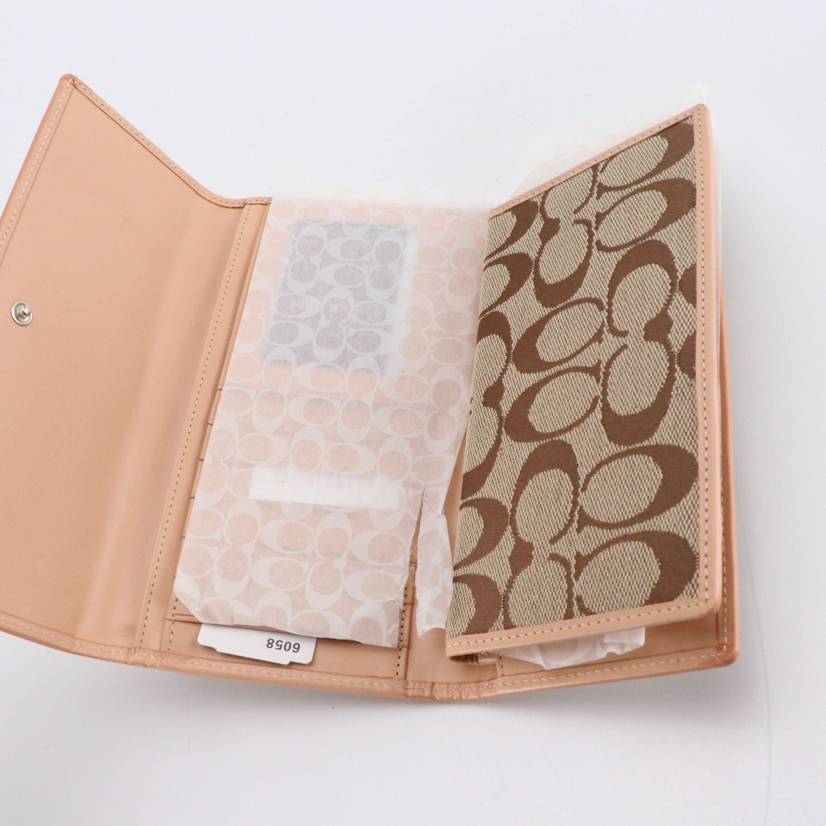 Dooney & Bourke Flap Wristlet with Coach Signature Stripe Clutch Wallets