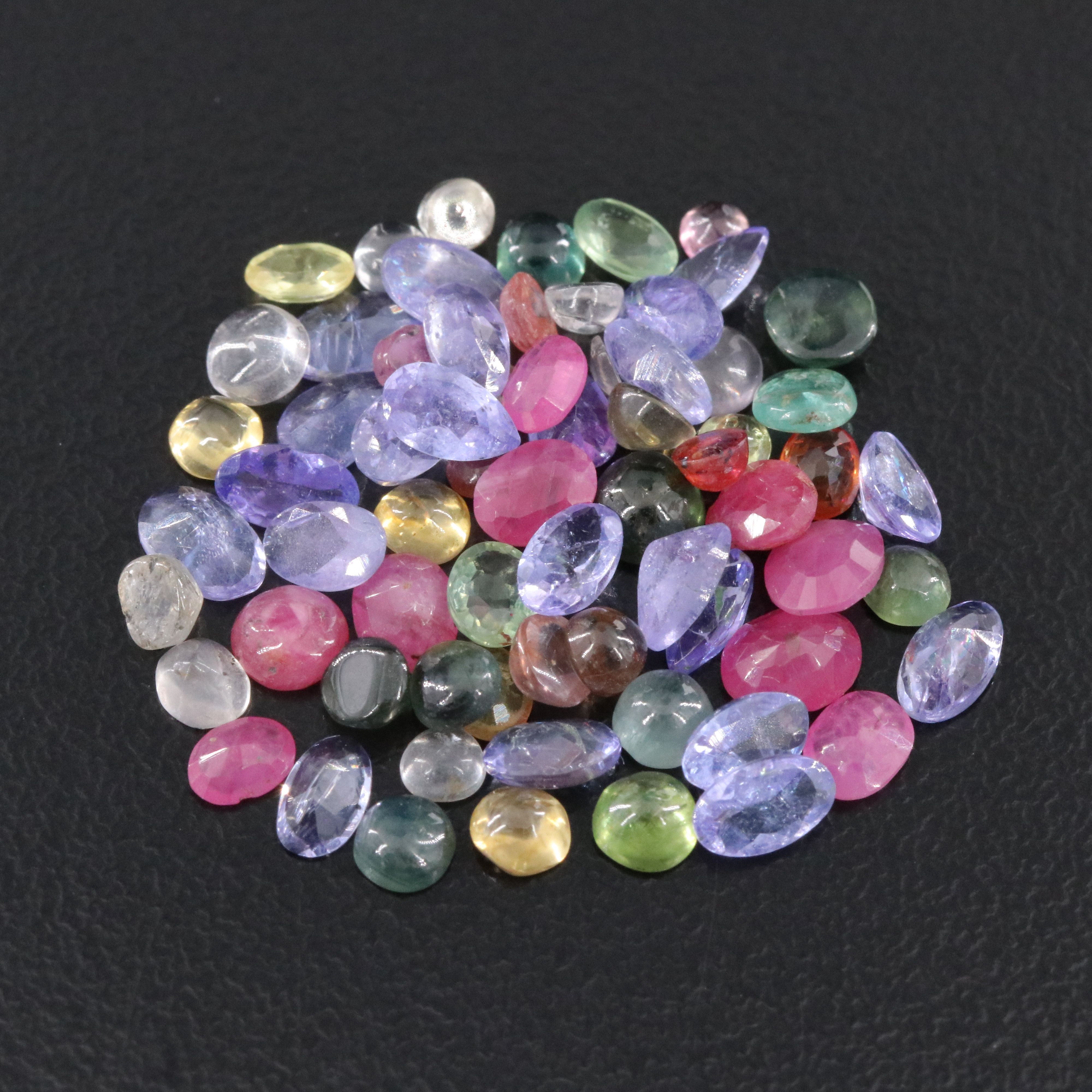 Loose 14.27 CTW Gemstone Lot Including Sapphire, Tanzanite and Ruby