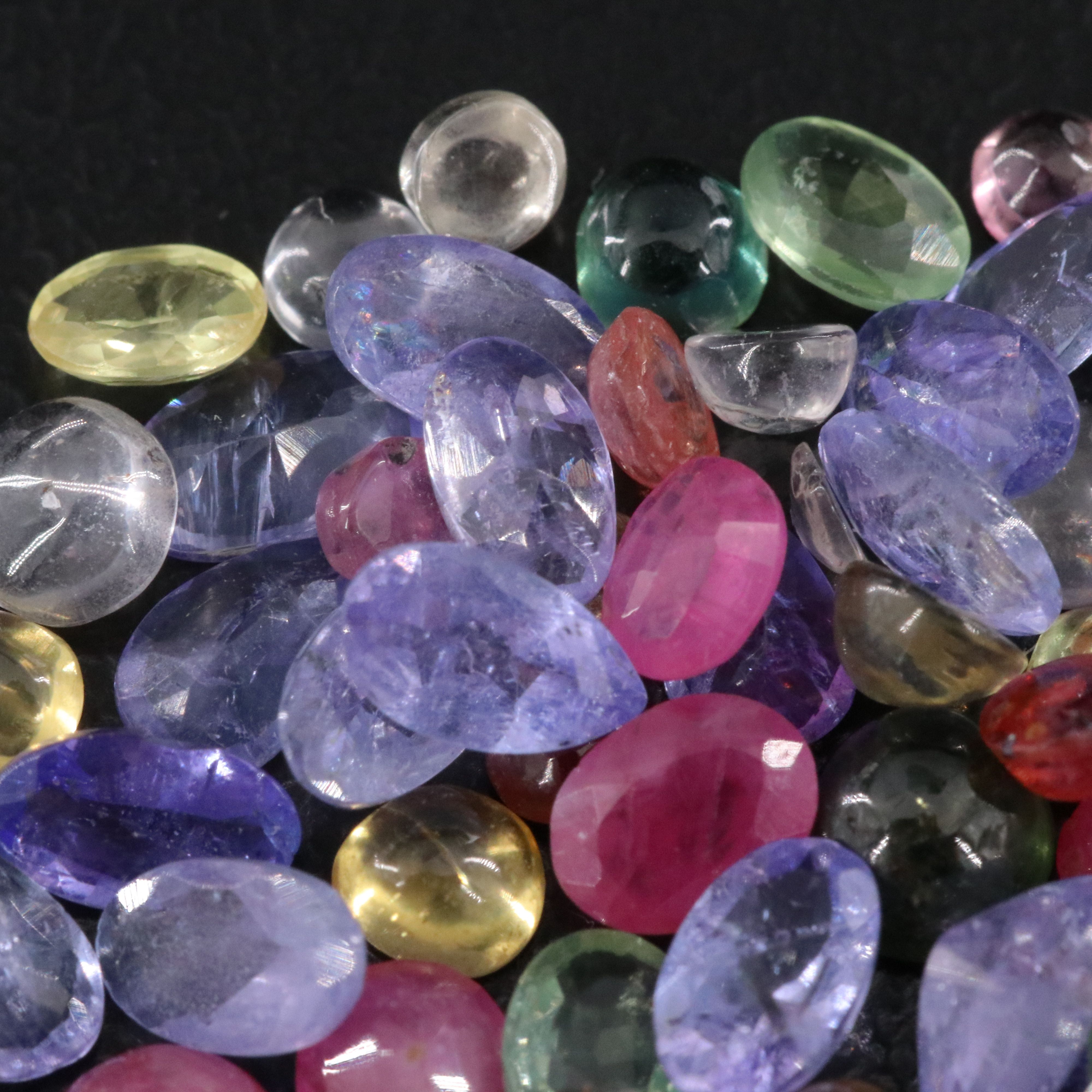 Loose 14.27 CTW Gemstone Lot Including Sapphire, Tanzanite and Ruby