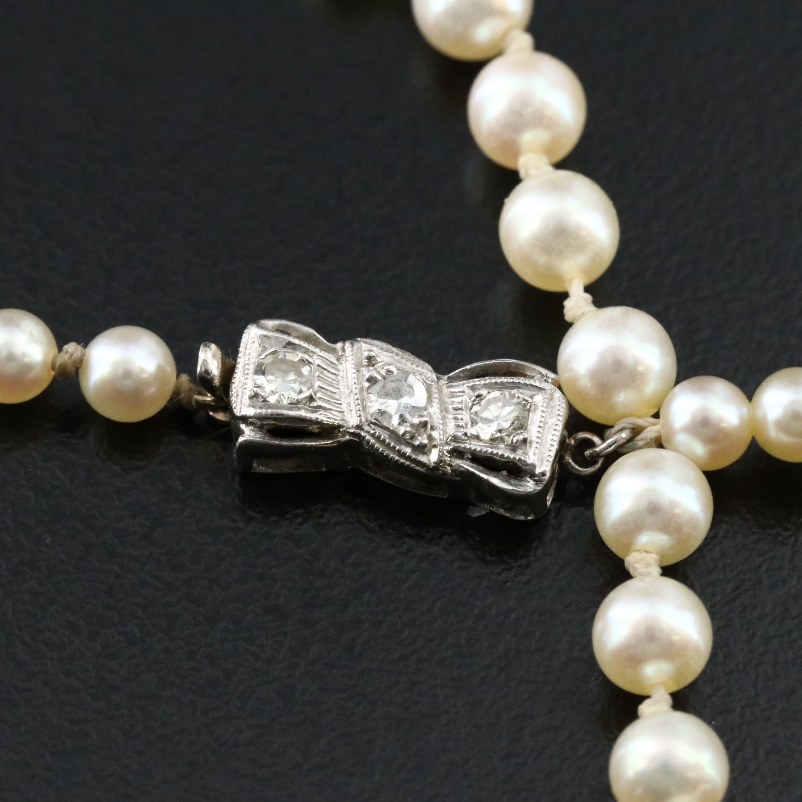 Pearl Graduated Matinee Necklace with a Platinum Diamond Accented Clasp
