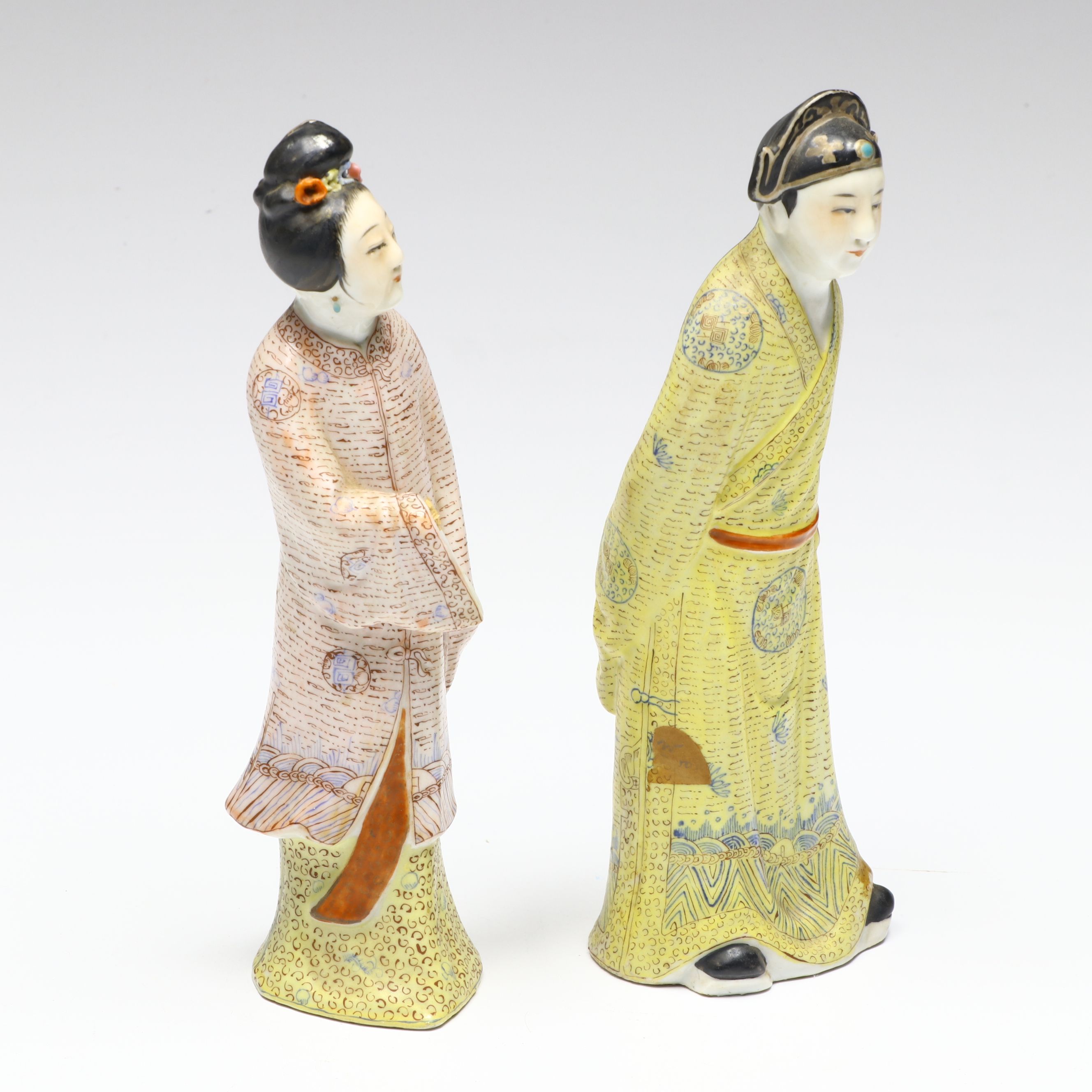 Chinese Famille Rose Traditionally Dressed Male and Female Porcelain Figures