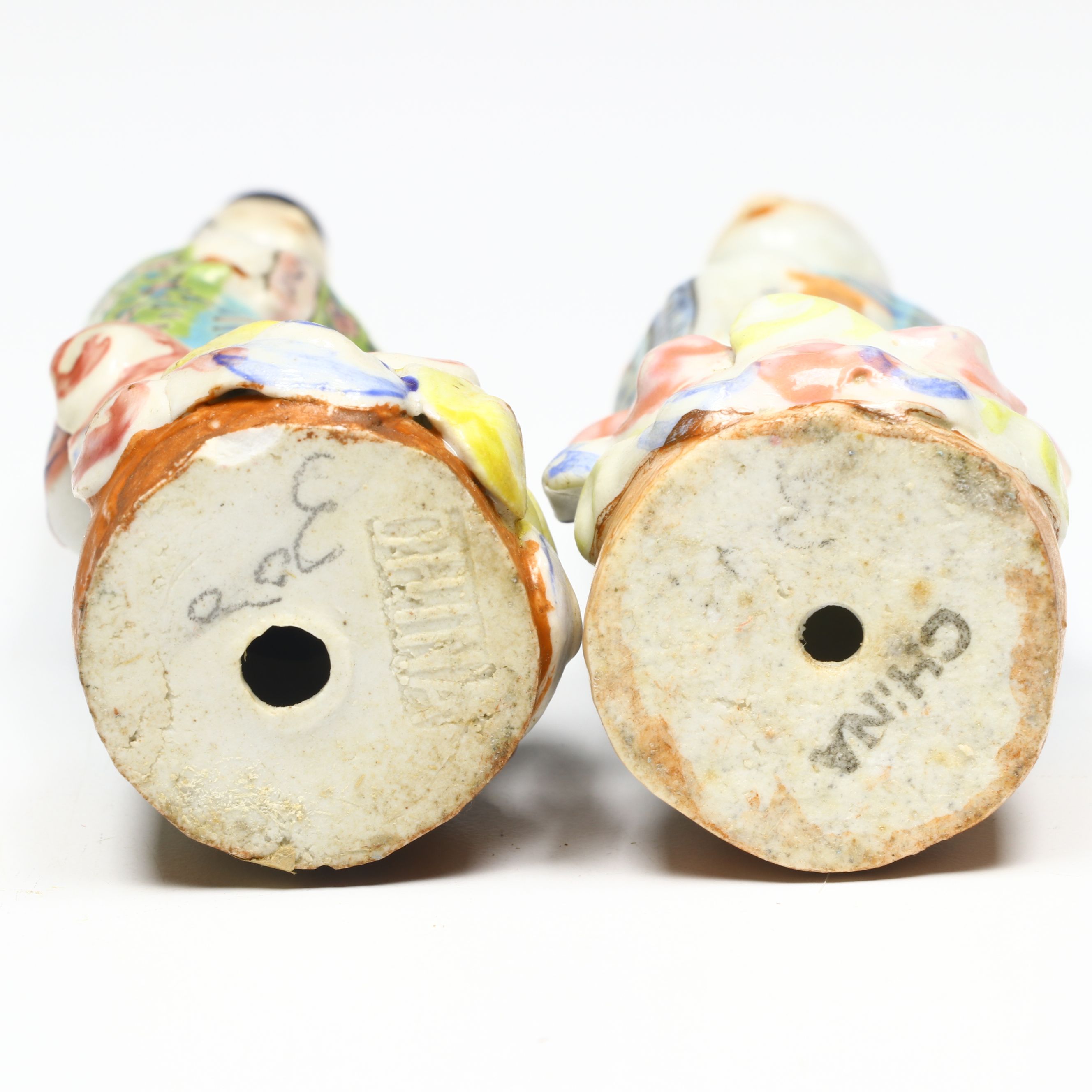 Chinese Famille Rose Traditionally Dressed Male and Female Porcelain Figures