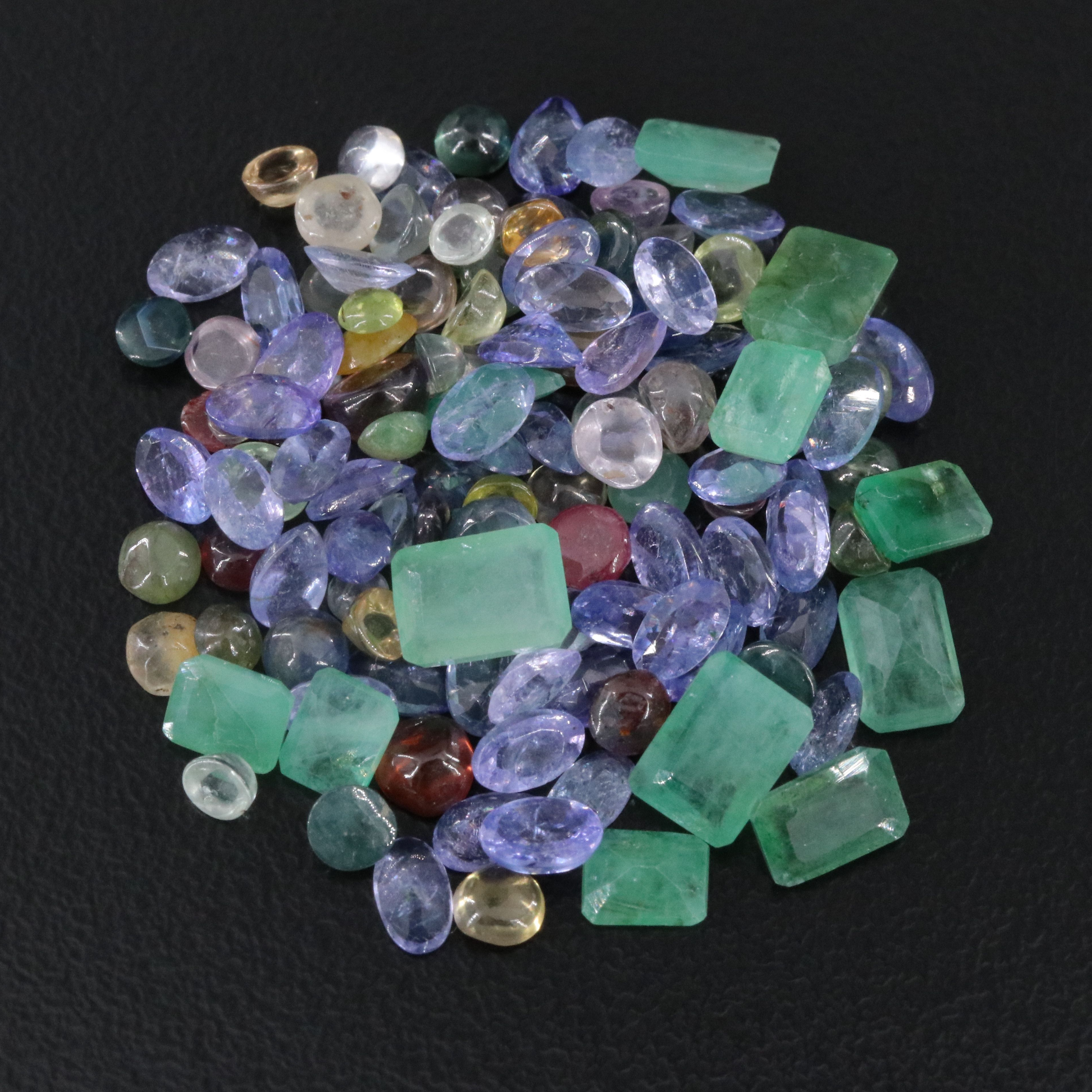Loose 33.29 CTW Gemstone Lot Including Tanzanite, Emerald and Ruby