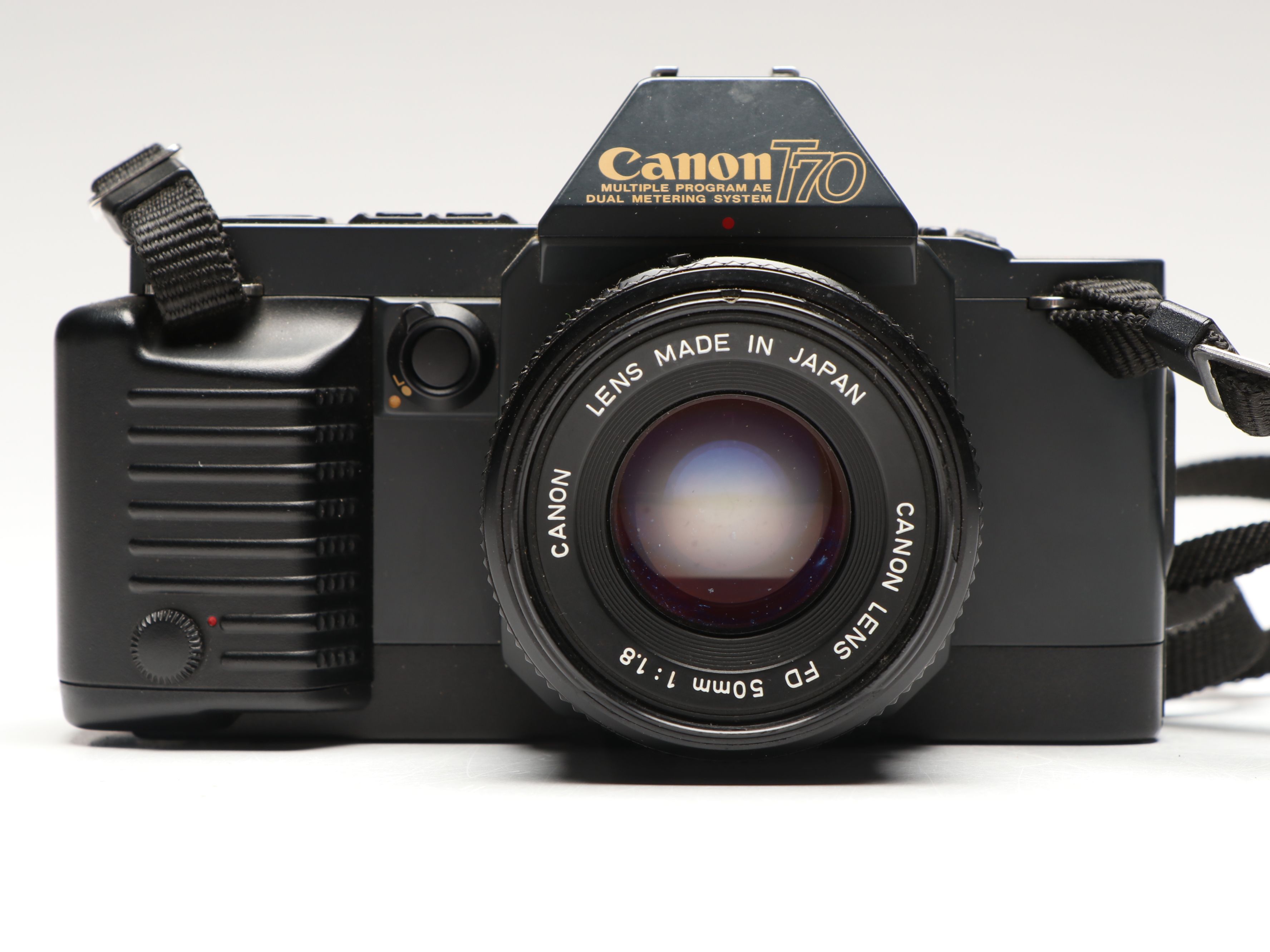 Canon T70 and TX 35mm Film Cameras with Lens