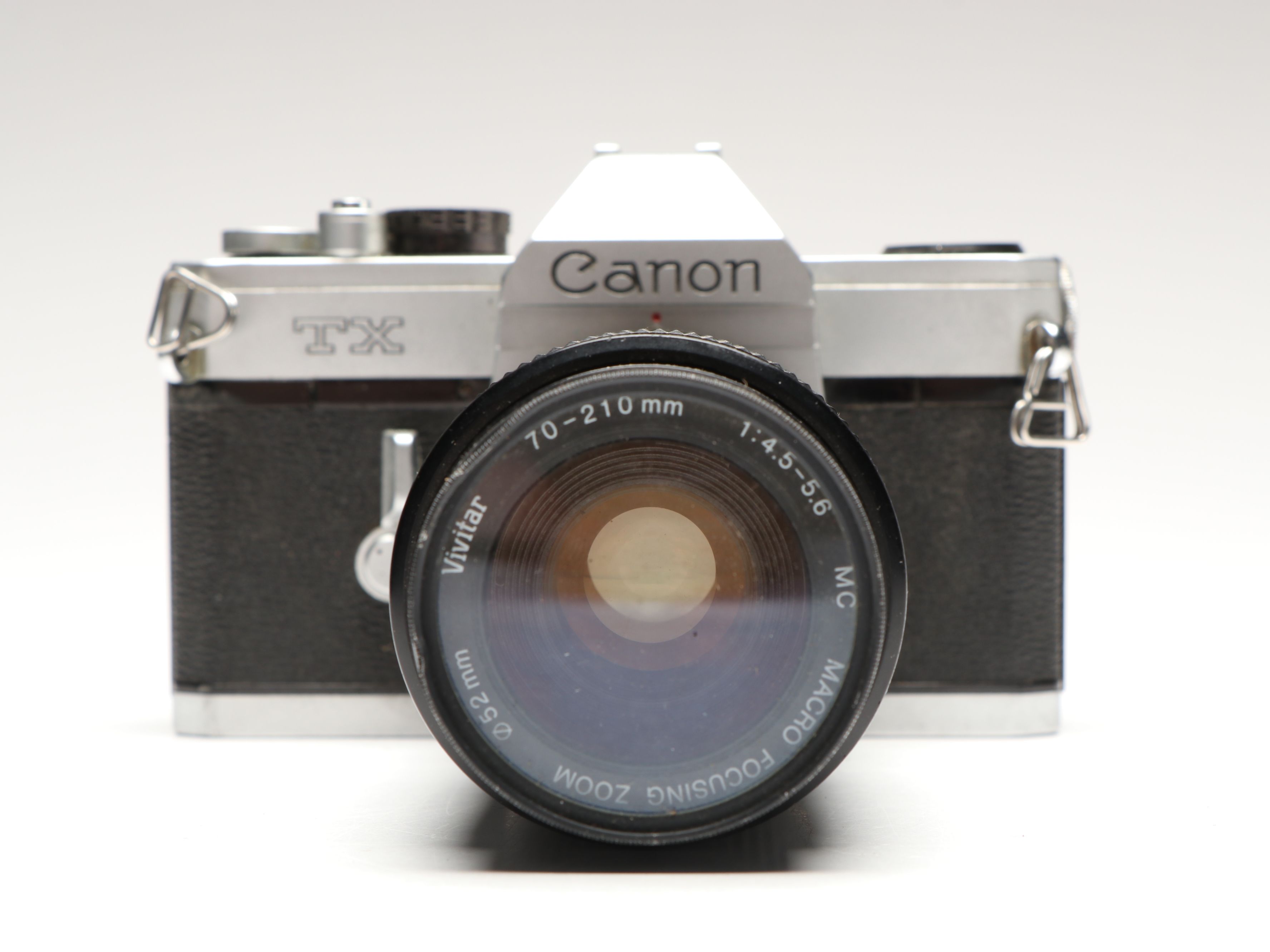 Canon T70 and TX 35mm Film Cameras with Lens