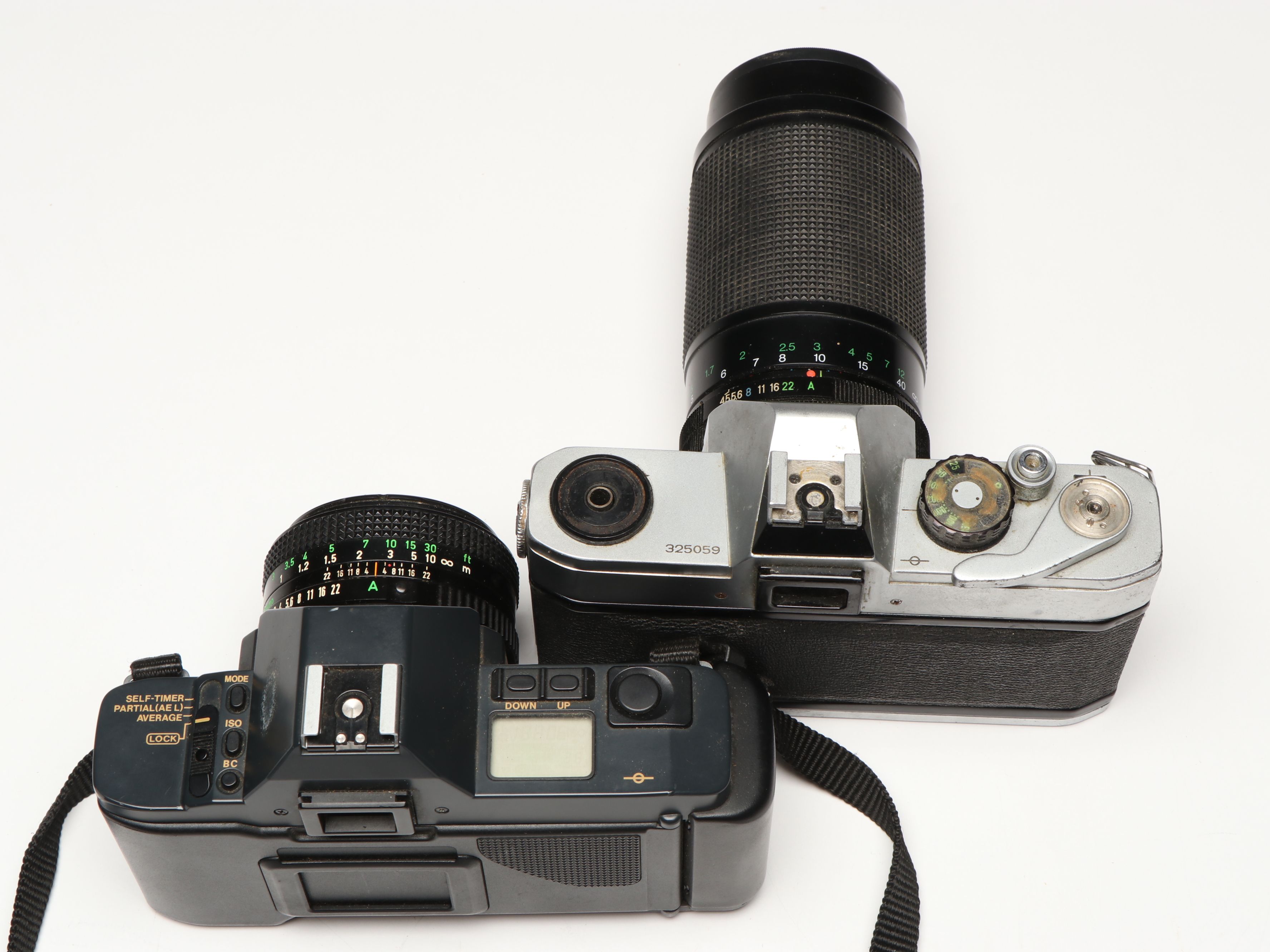 Canon T70 and TX 35mm Film Cameras with Lens