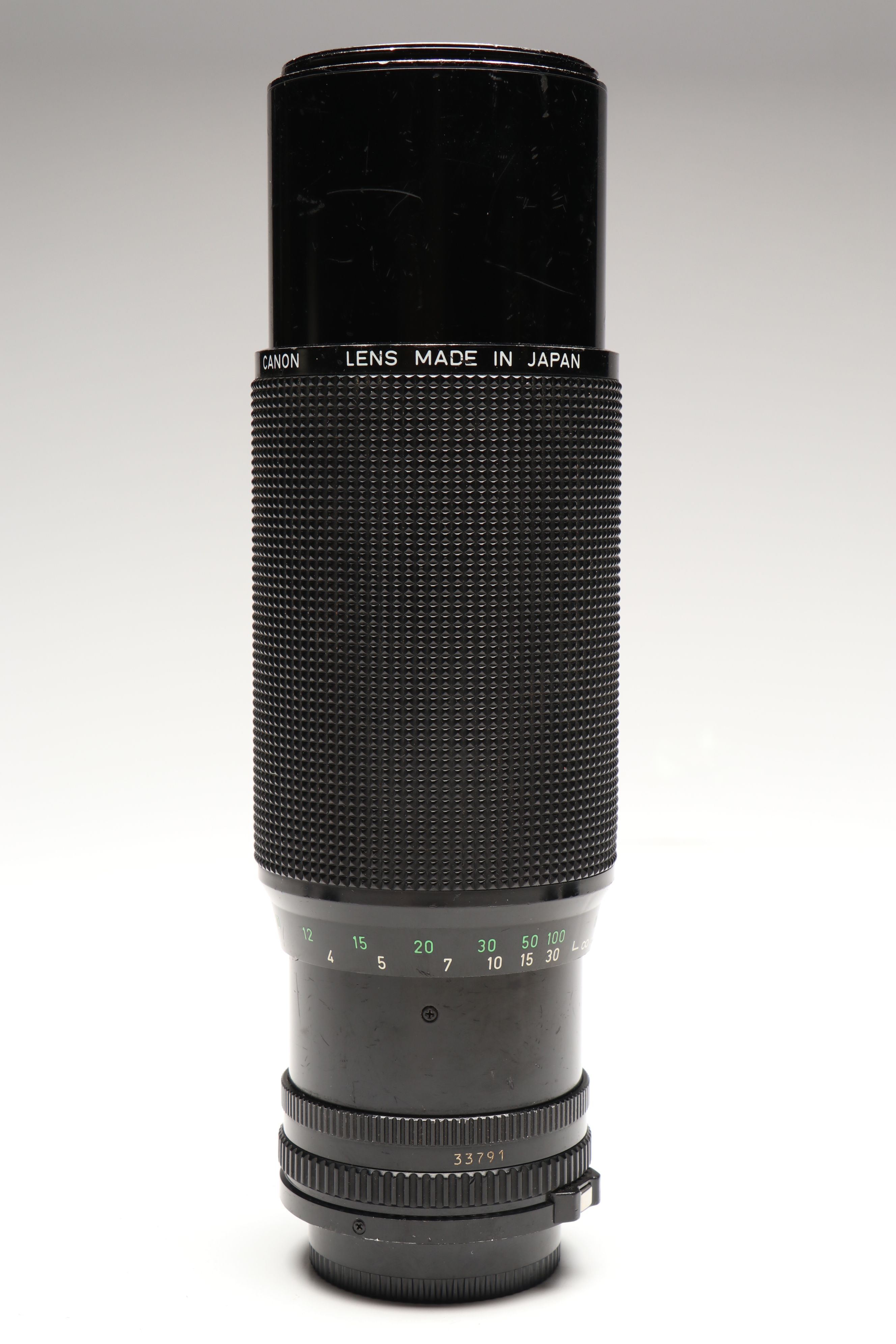 Canon T70 and TX 35mm Film Cameras with Lens