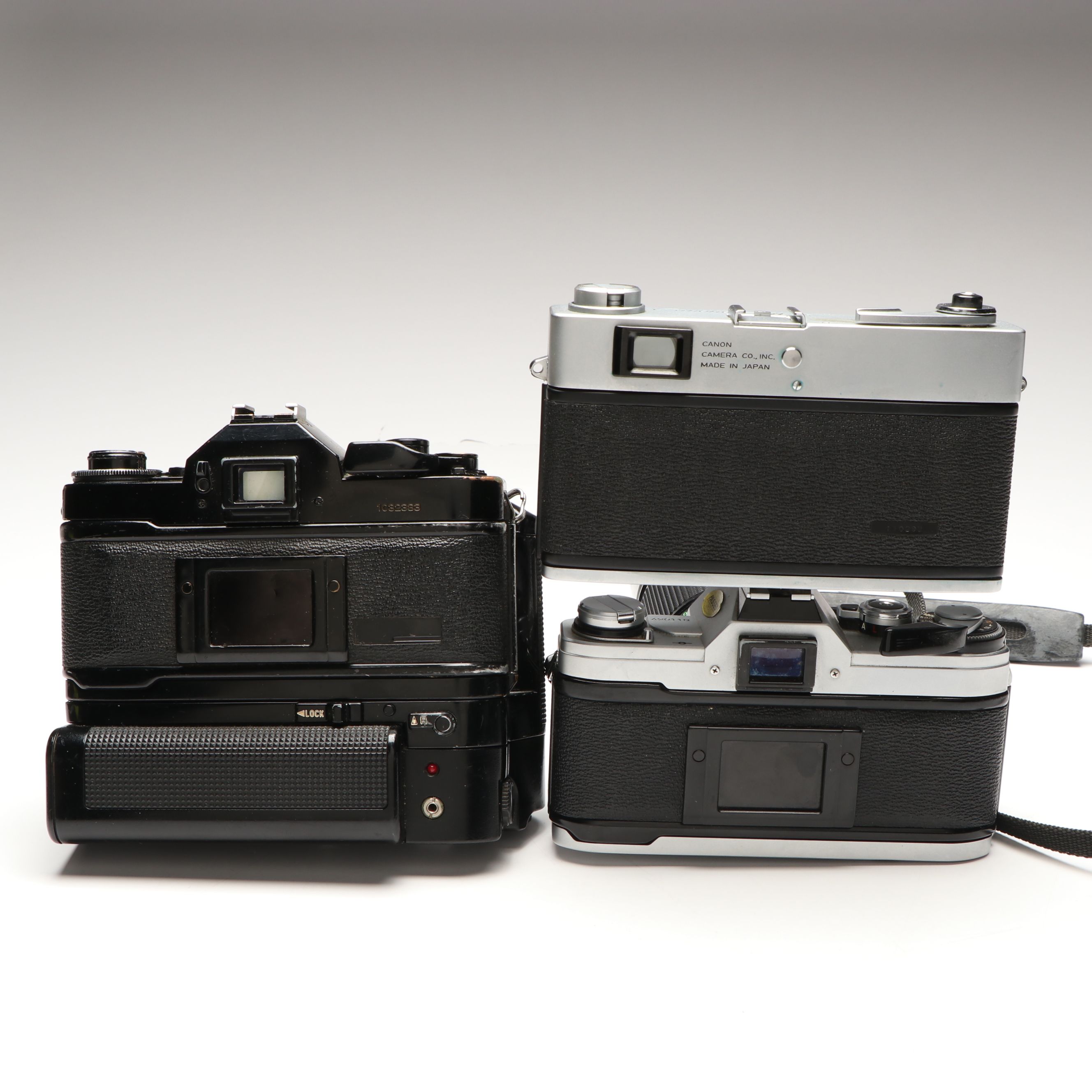 Canon A-1, AT-1 and QL 25mm Film Cameras with Camera Lens