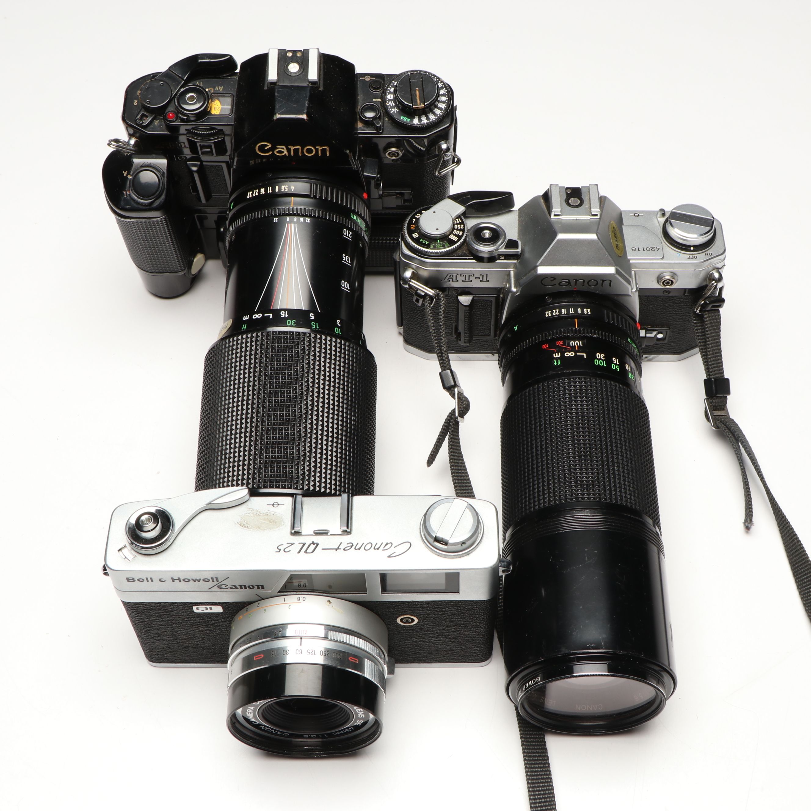 Canon A-1, AT-1 and QL 25mm Film Cameras with Camera Lens