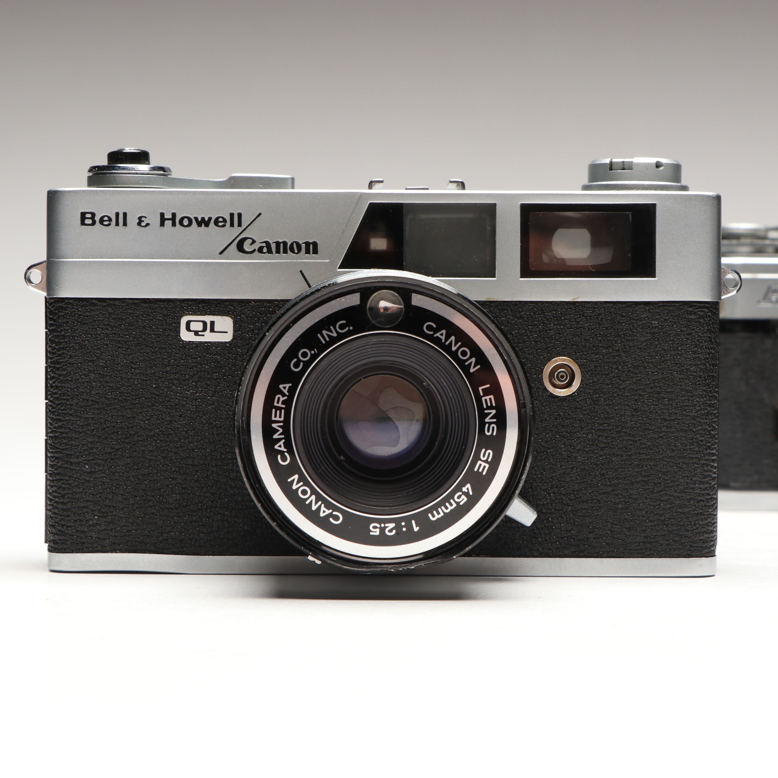 Canon A-1, AT-1 and QL 25mm Film Cameras with Camera Lens