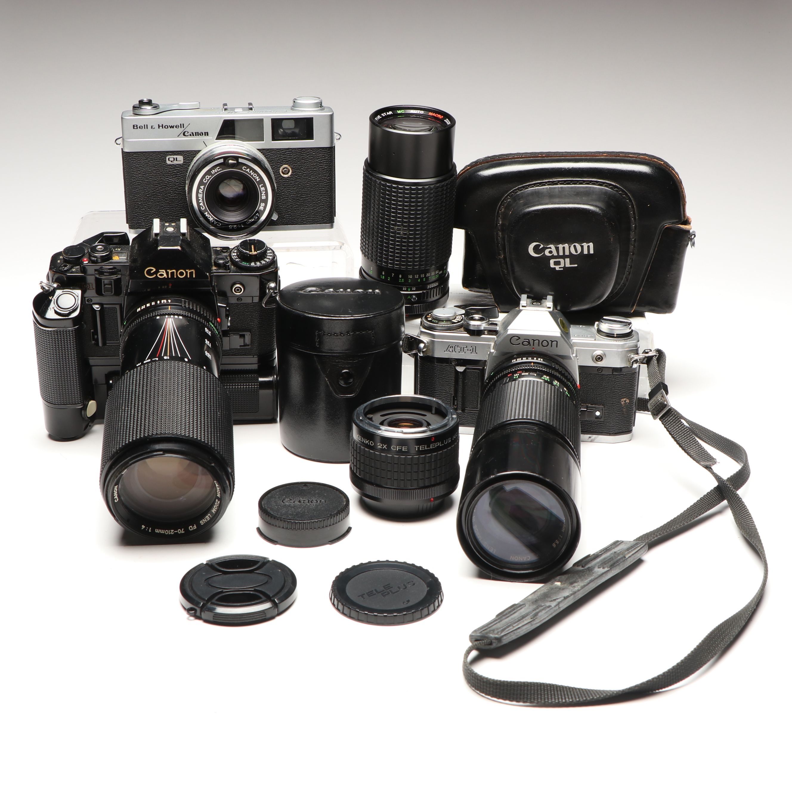 Canon A-1, AT-1 and QL 25mm Film Cameras with Camera Lens