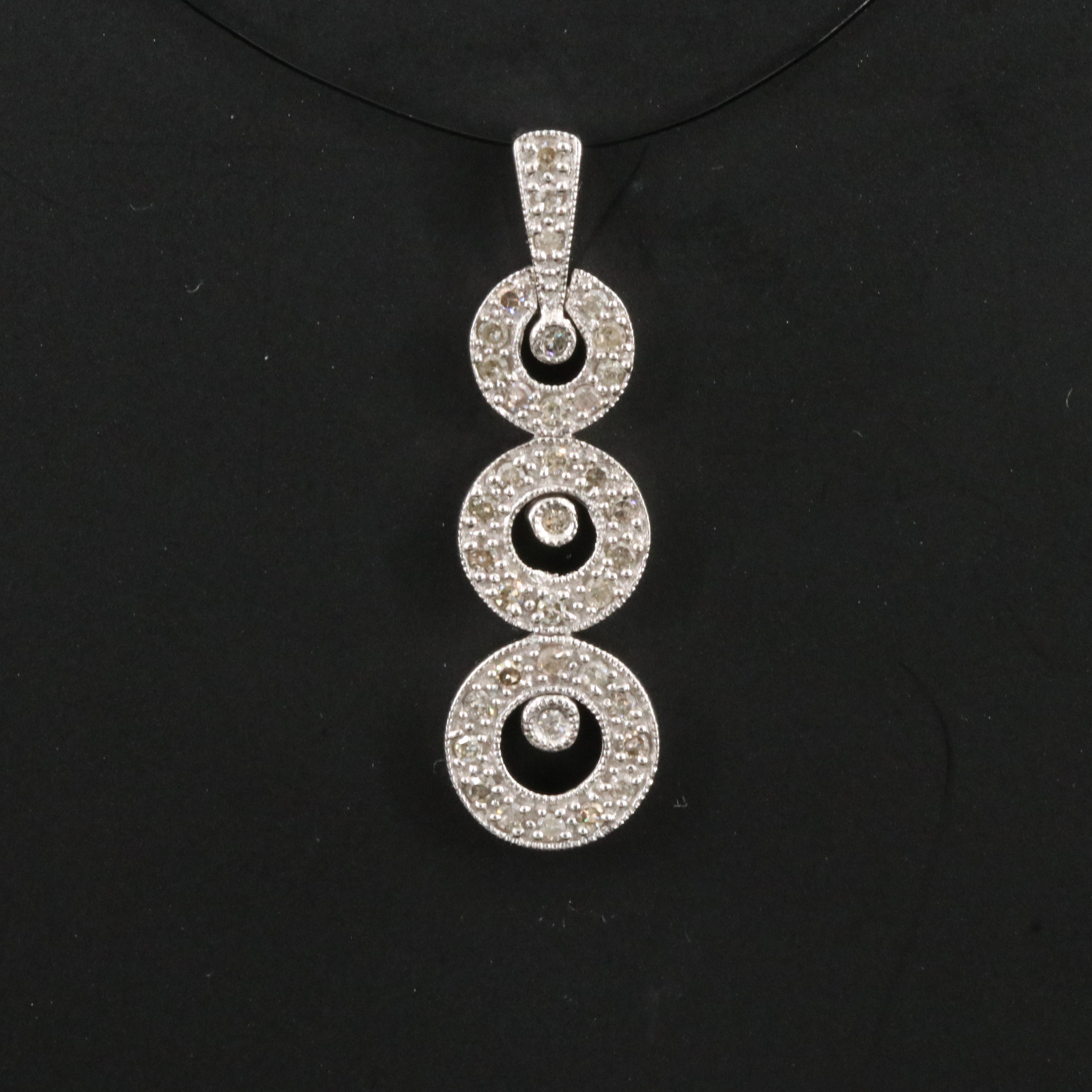 10K 0.26 CTW Diamond Graduated Circle Pendant