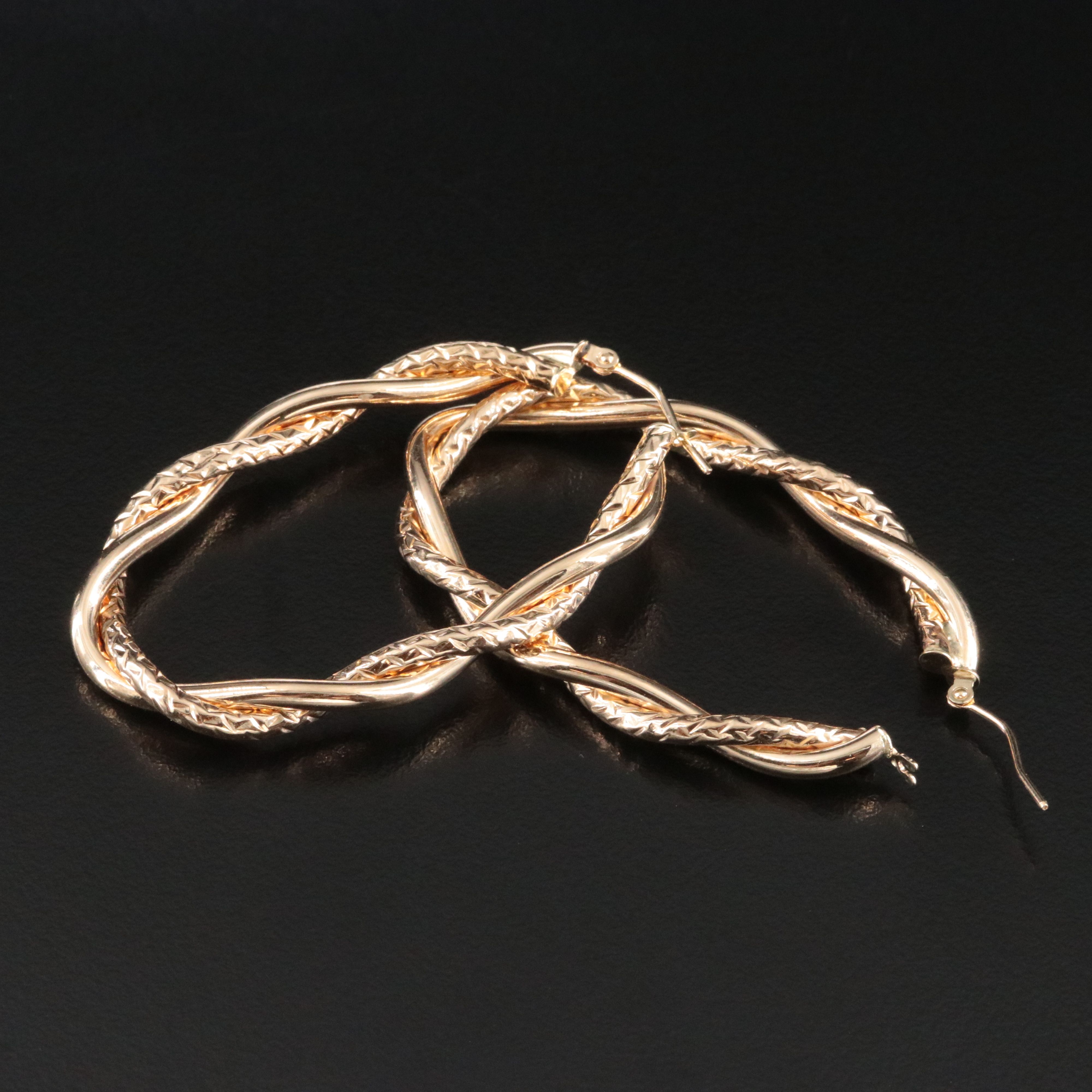 14K Braided Oval Hoop Earrings with Diamond-Cut Finish