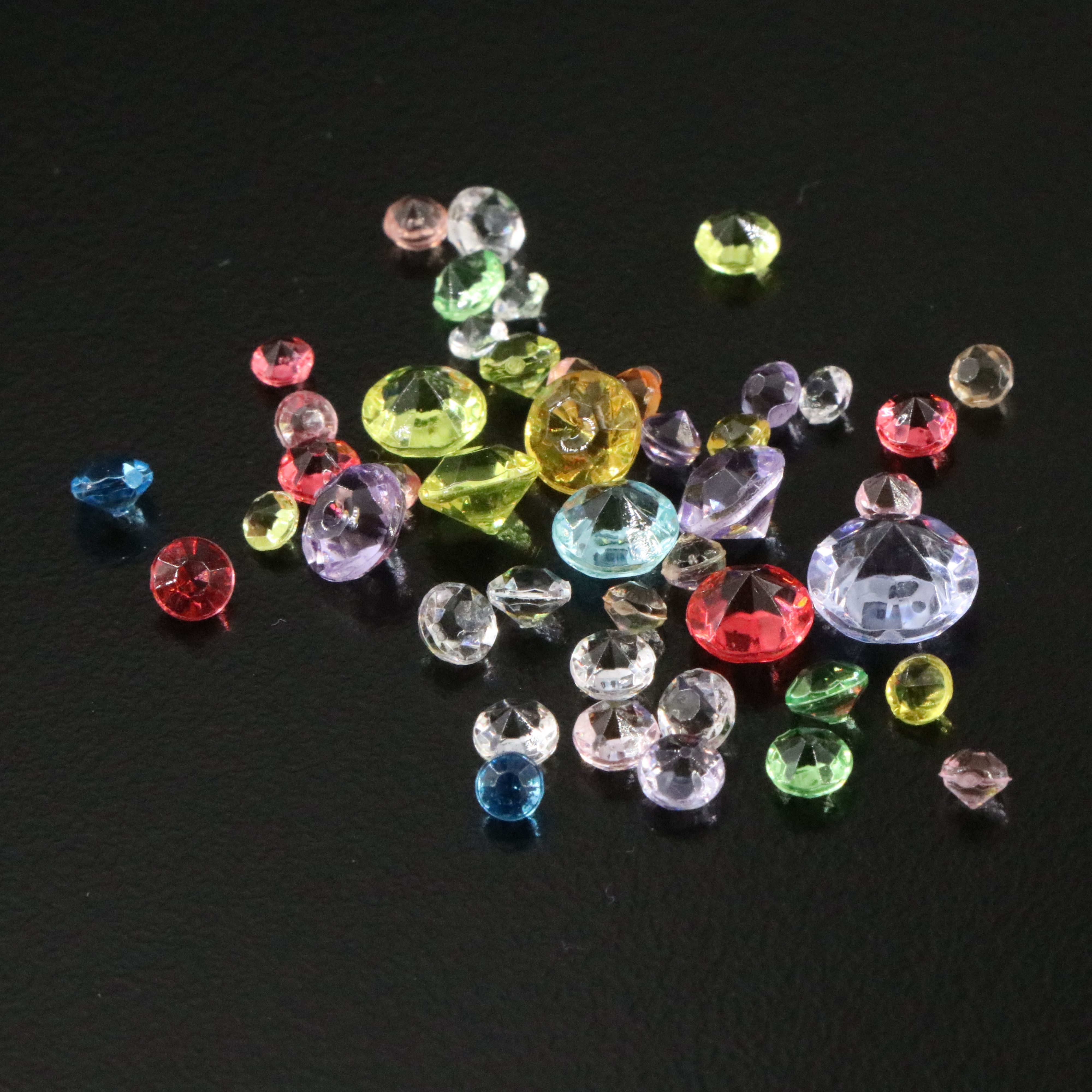 Loose Colorless and Colored Stone Imitations and CZ