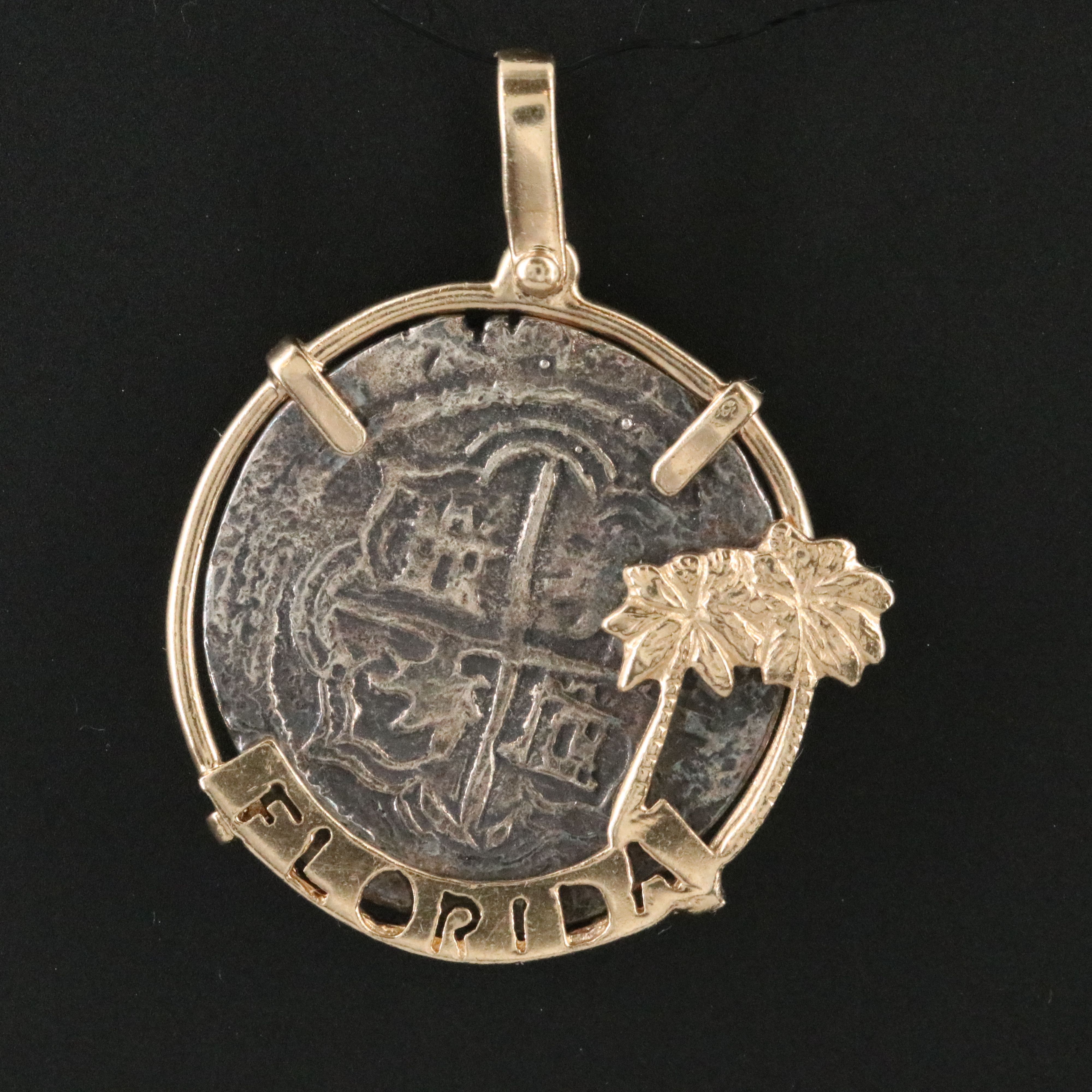 10K and 14K Souvenir Pendant with Reproduction Spanish "Shipwreck" Silver Coin