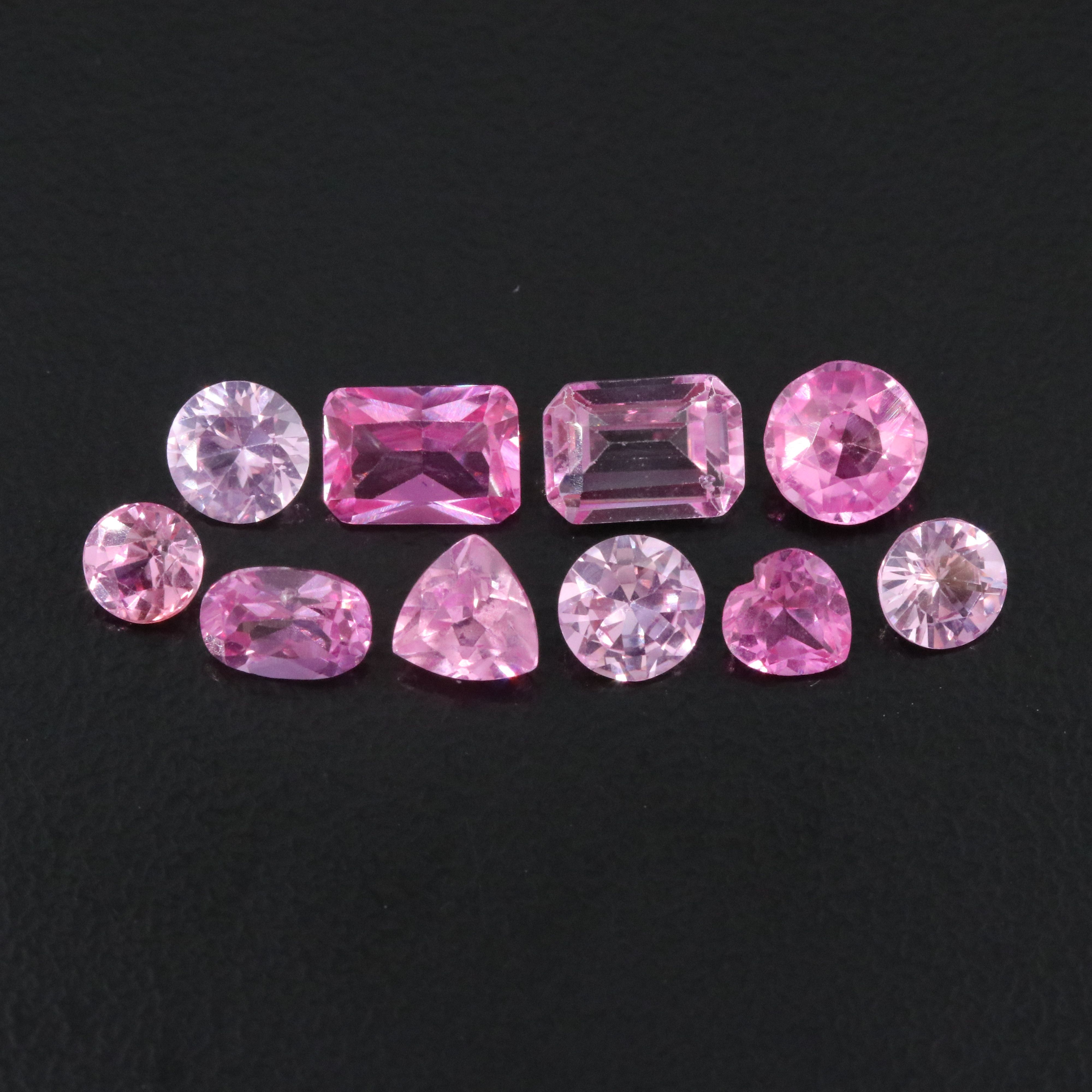 Loose 6.87 CTW Gemstone Lot Including Lab Grown Sapphire and Topaz