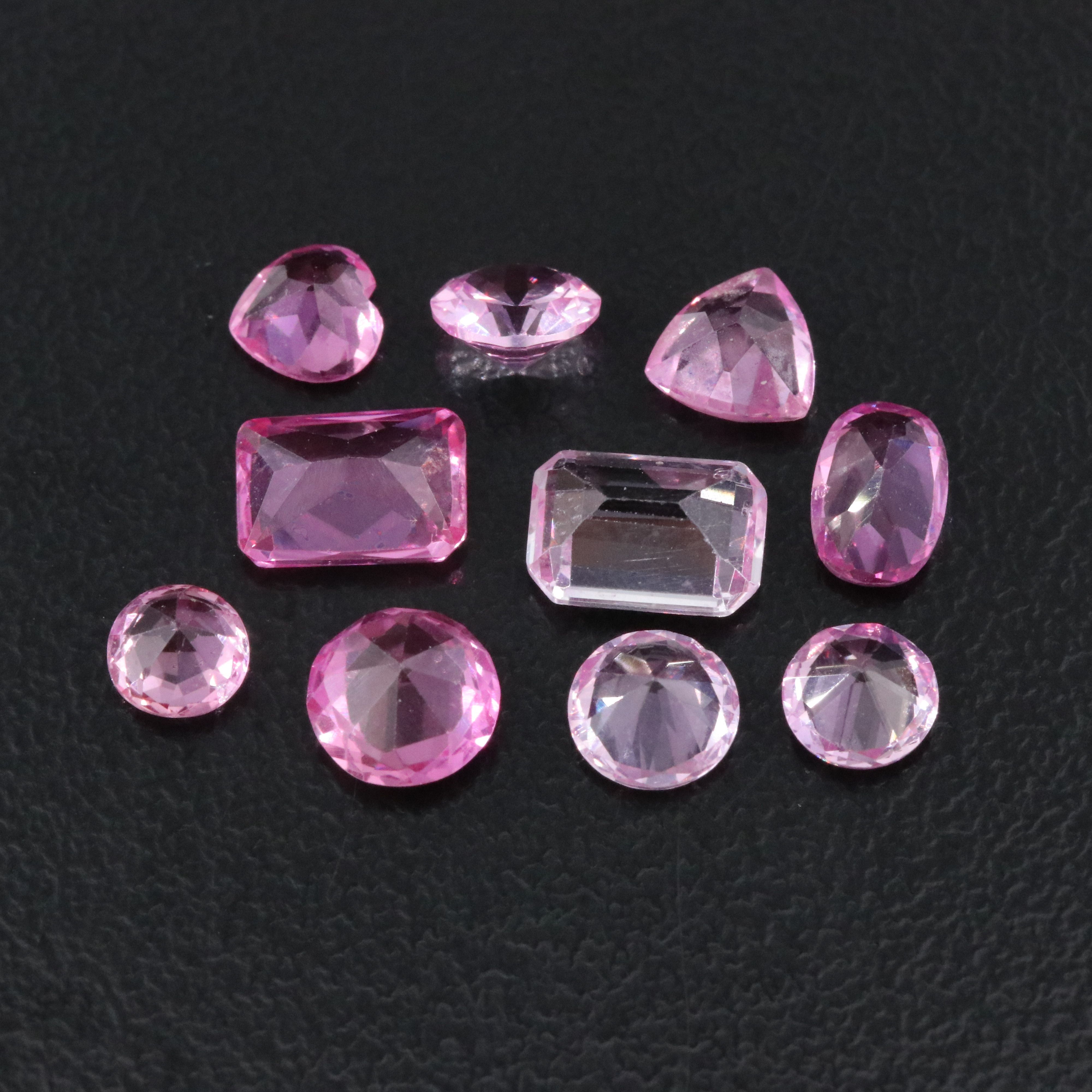 Loose 6.87 CTW Gemstone Lot Including Lab Grown Sapphire and Topaz