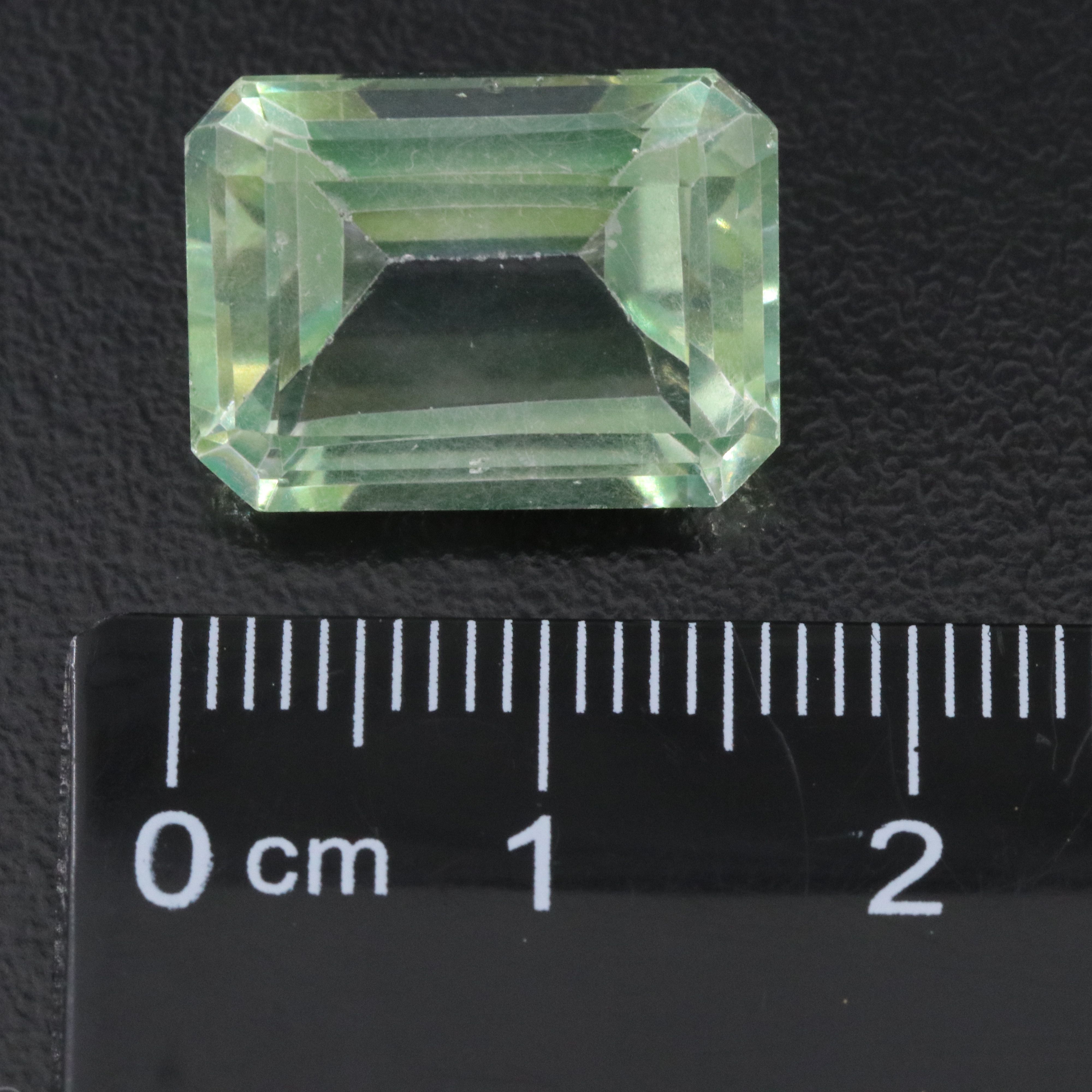 Loose 58.40 CTW Gemstone Lot Including Topaz, Garnet and Lab Grown Ruby