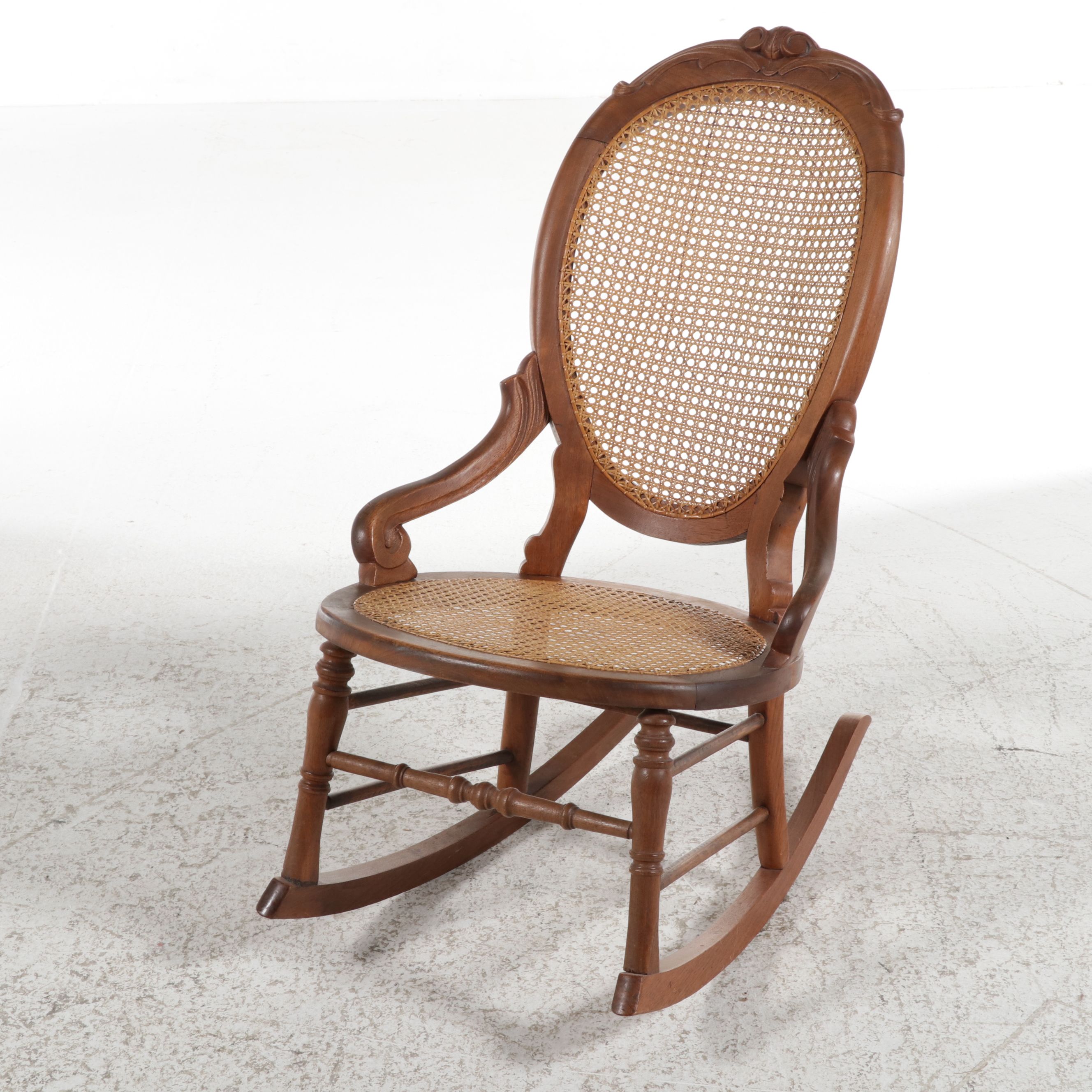 Victorian Walnut Rocking Chair with Caned Seat and Back, Late 19th Century