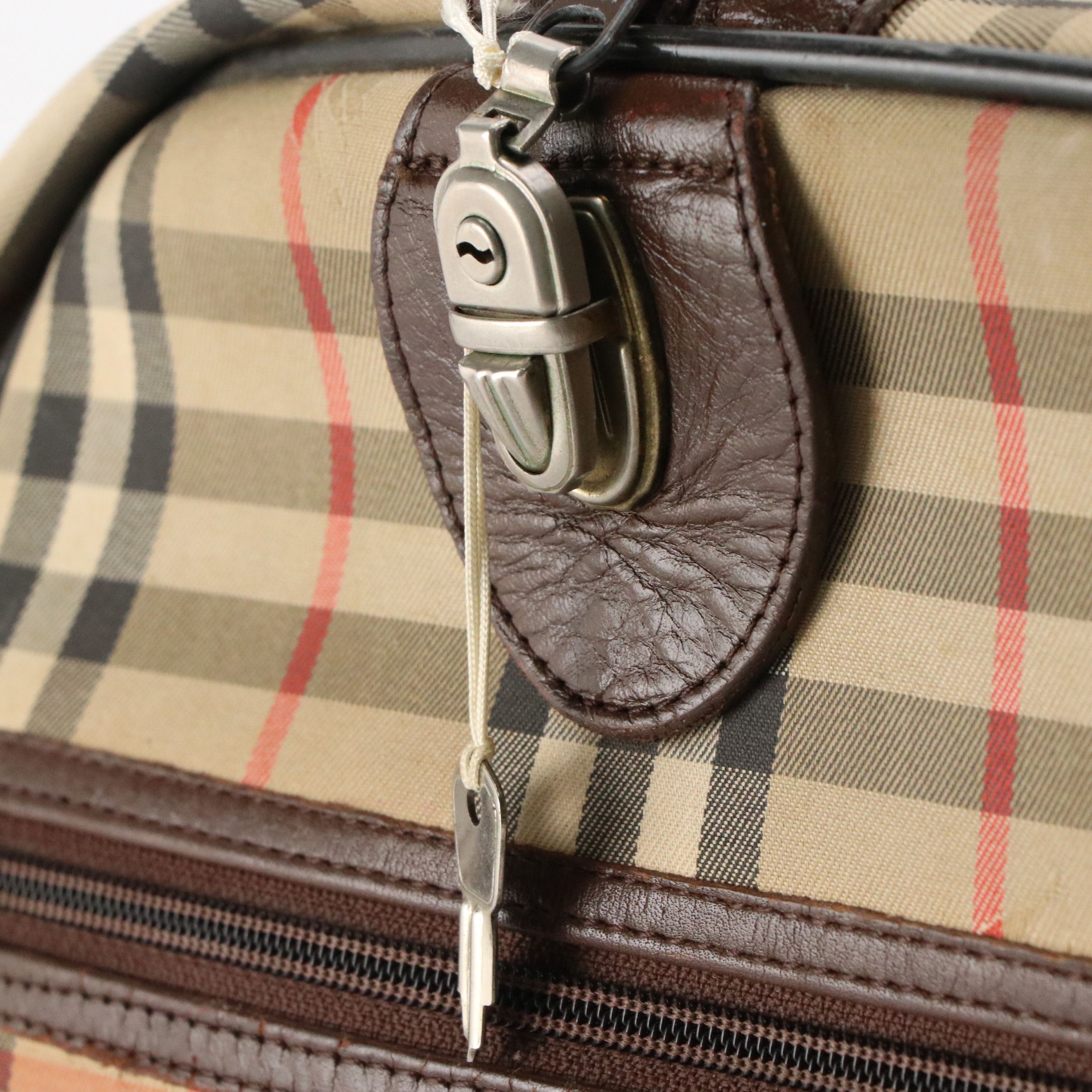 Burberrys Locking Duffle Bag in Haymarket Check Canvas and Brown Leather