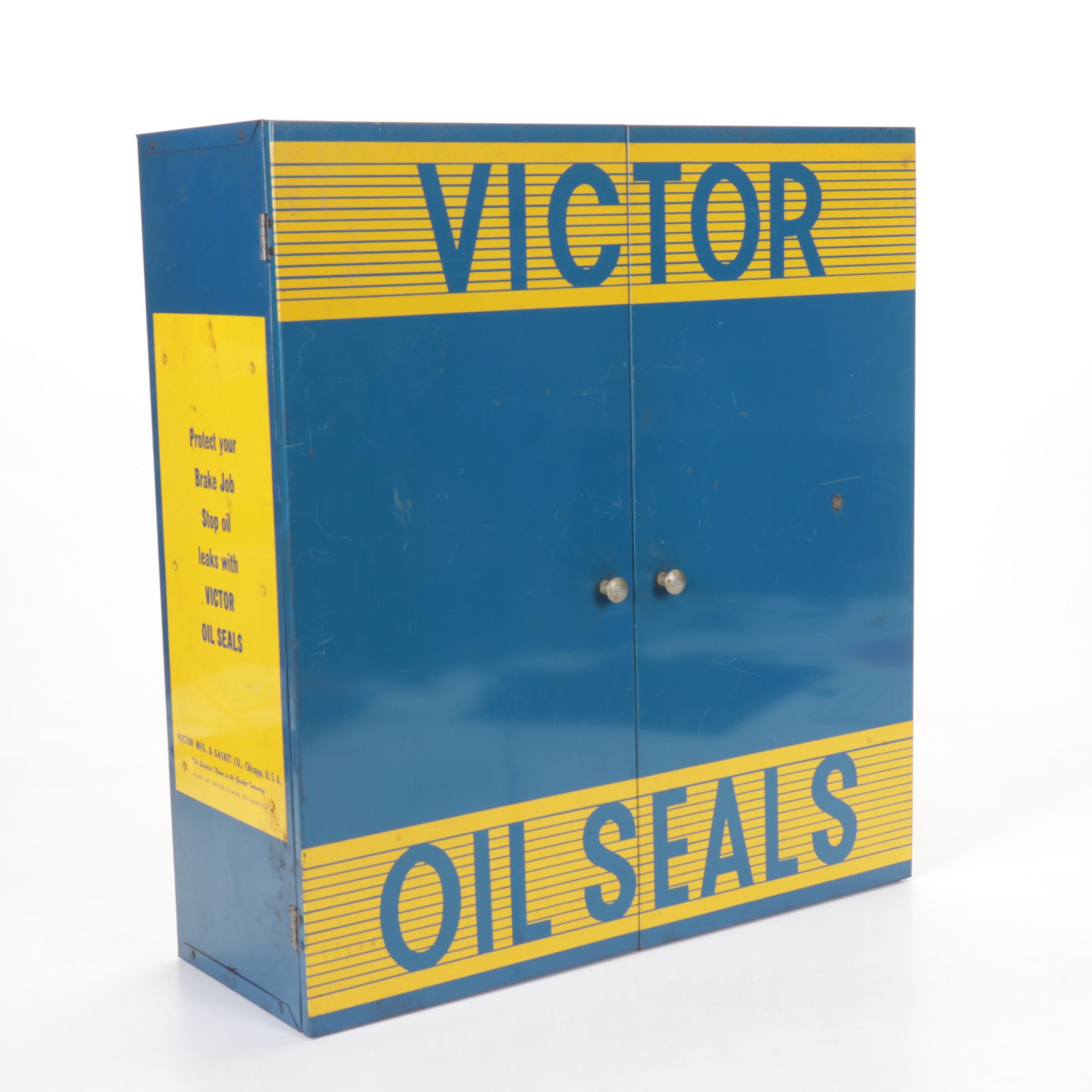 Victor Oil Seals Advertising Cabinet with Collection of Oil Seals, Mid-20th C.