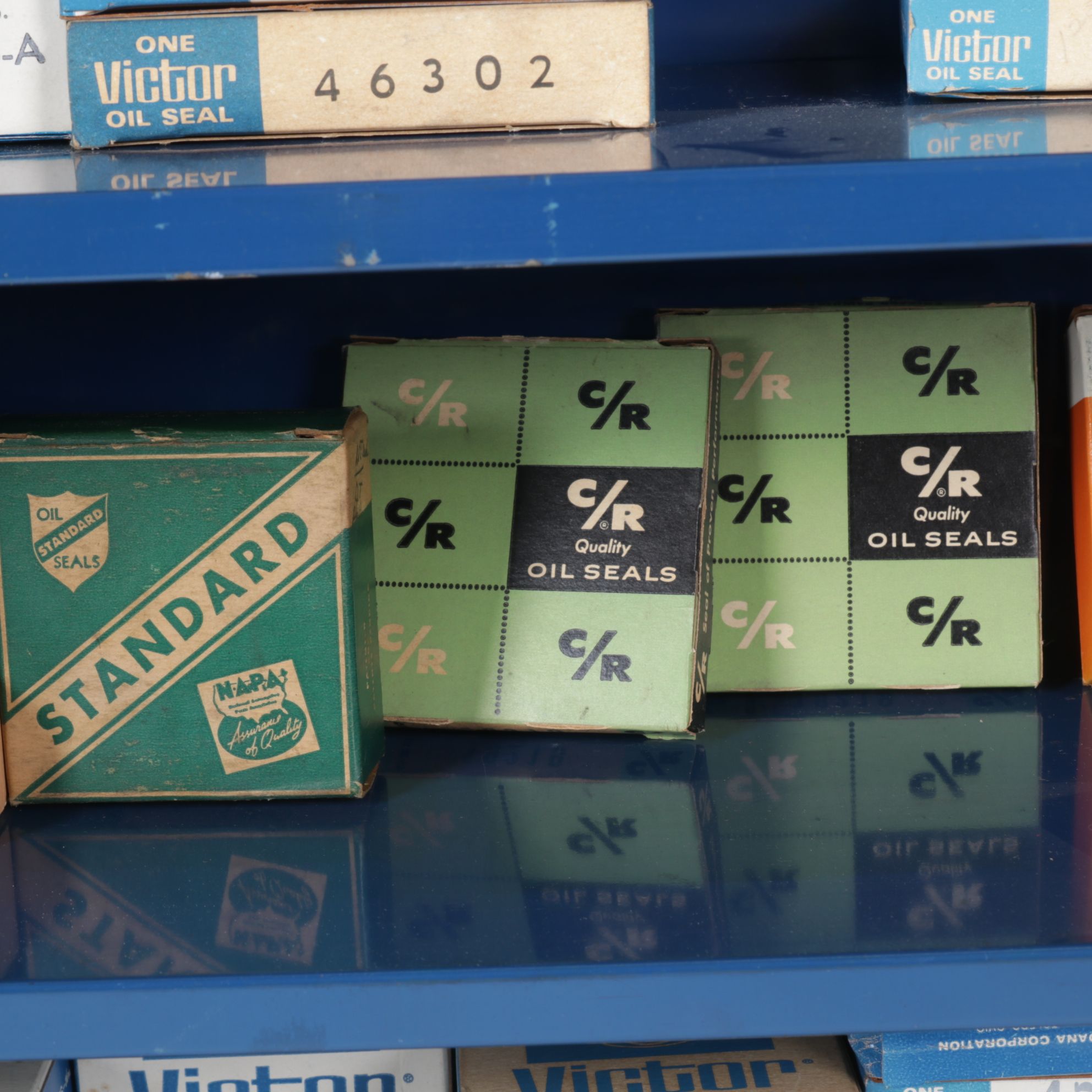 Victor Oil Seals Advertising Cabinet with Collection of Oil Seals, Mid-20th C.