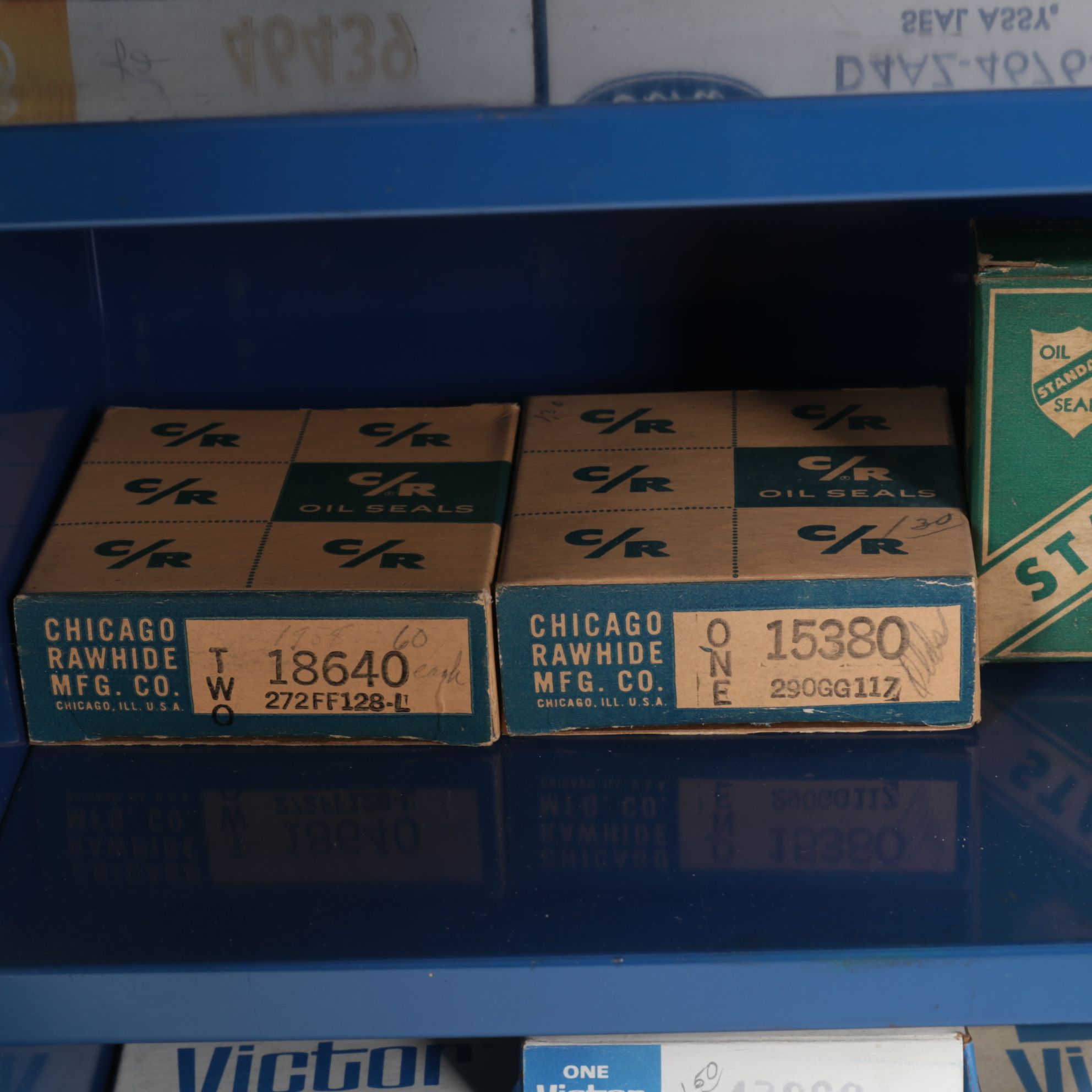 Victor Oil Seals Advertising Cabinet with Collection of Oil Seals, Mid-20th C.