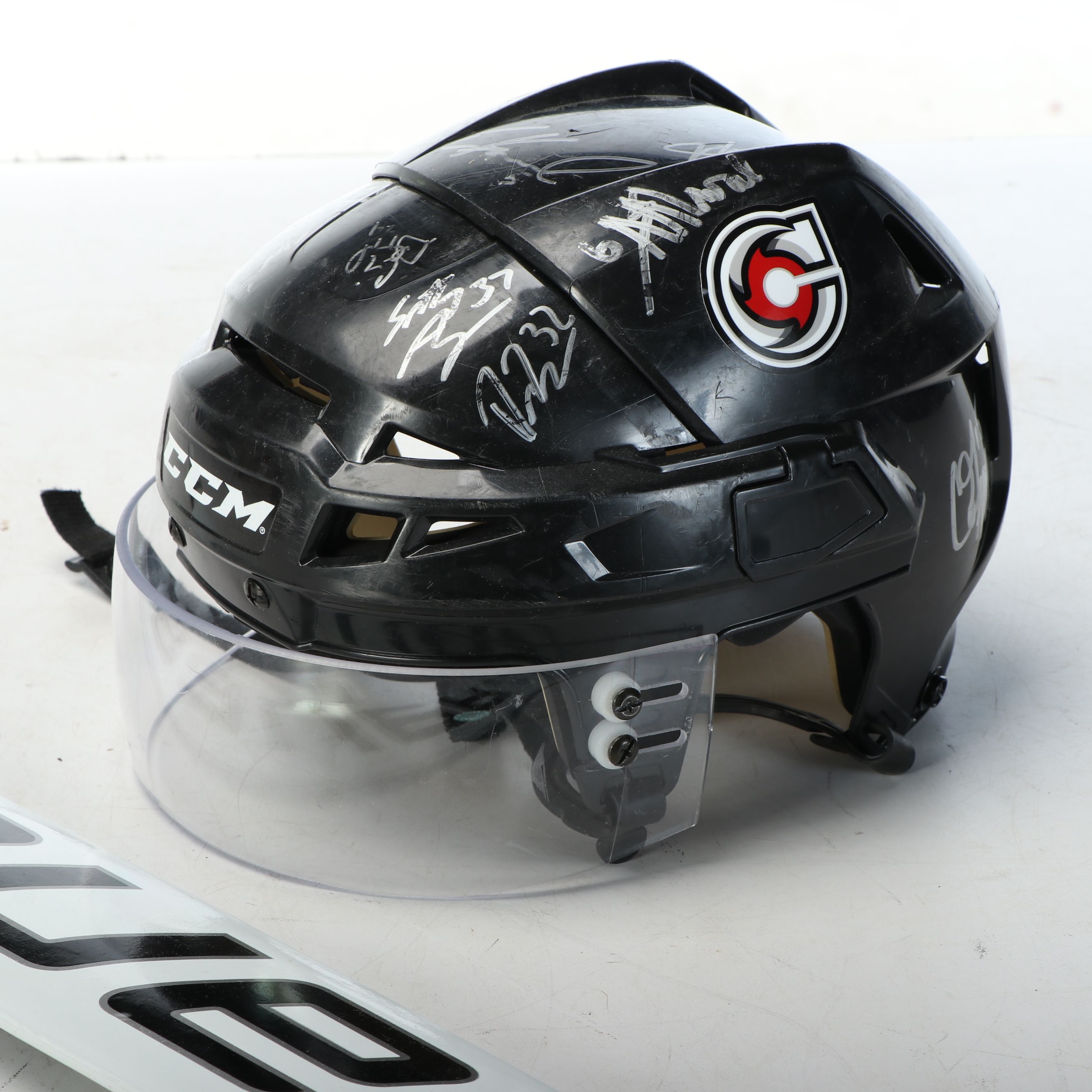 Team-Signed Cincinnati Cyclones Hockey Stick and Helmet, ECHL