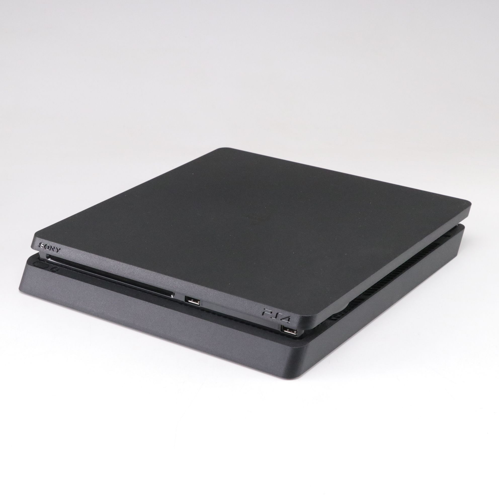 Sony PlayStation 4 Console with Video Games, Controller and Guide Books