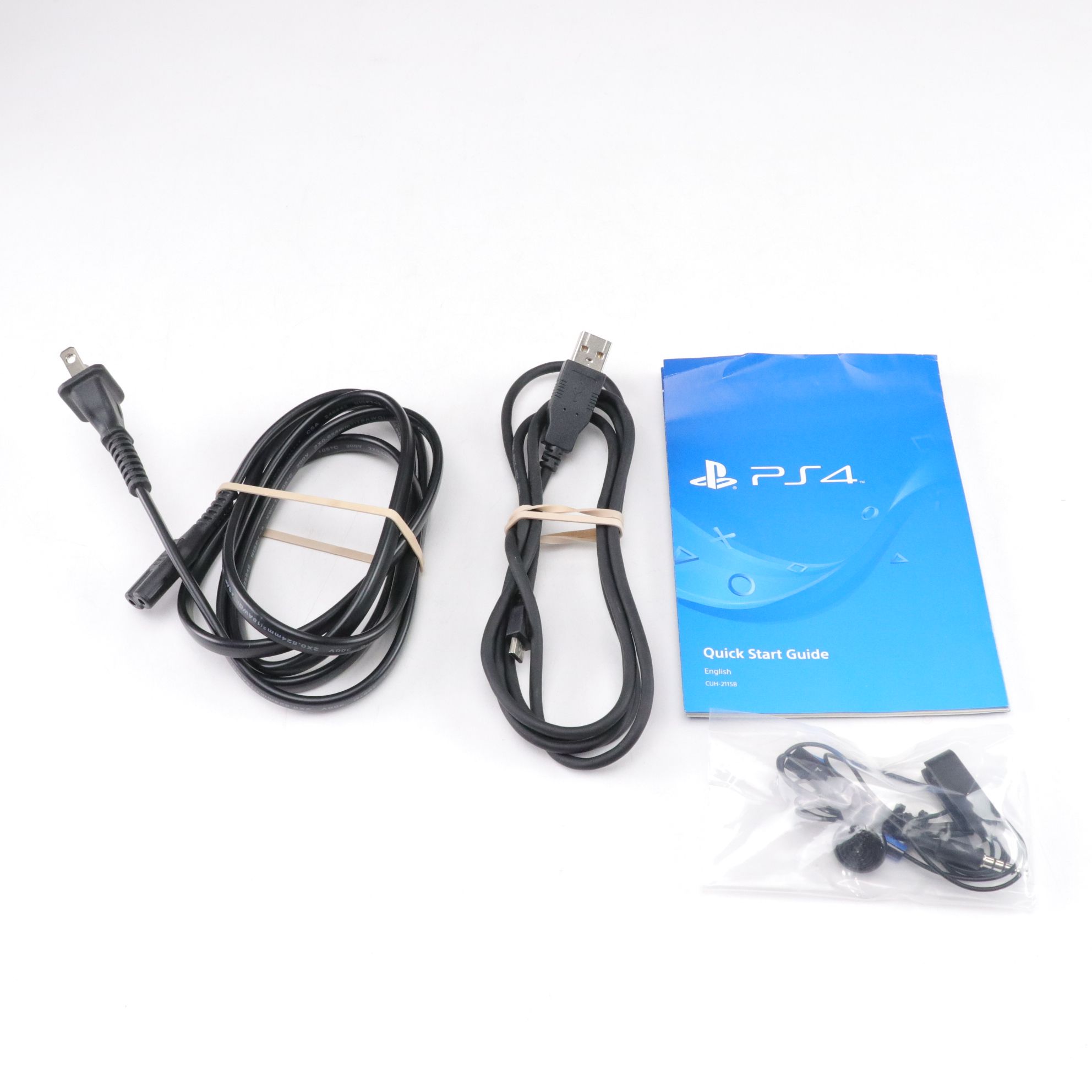 Sony PlayStation 4 Console with Video Games, Controller and Guide Books