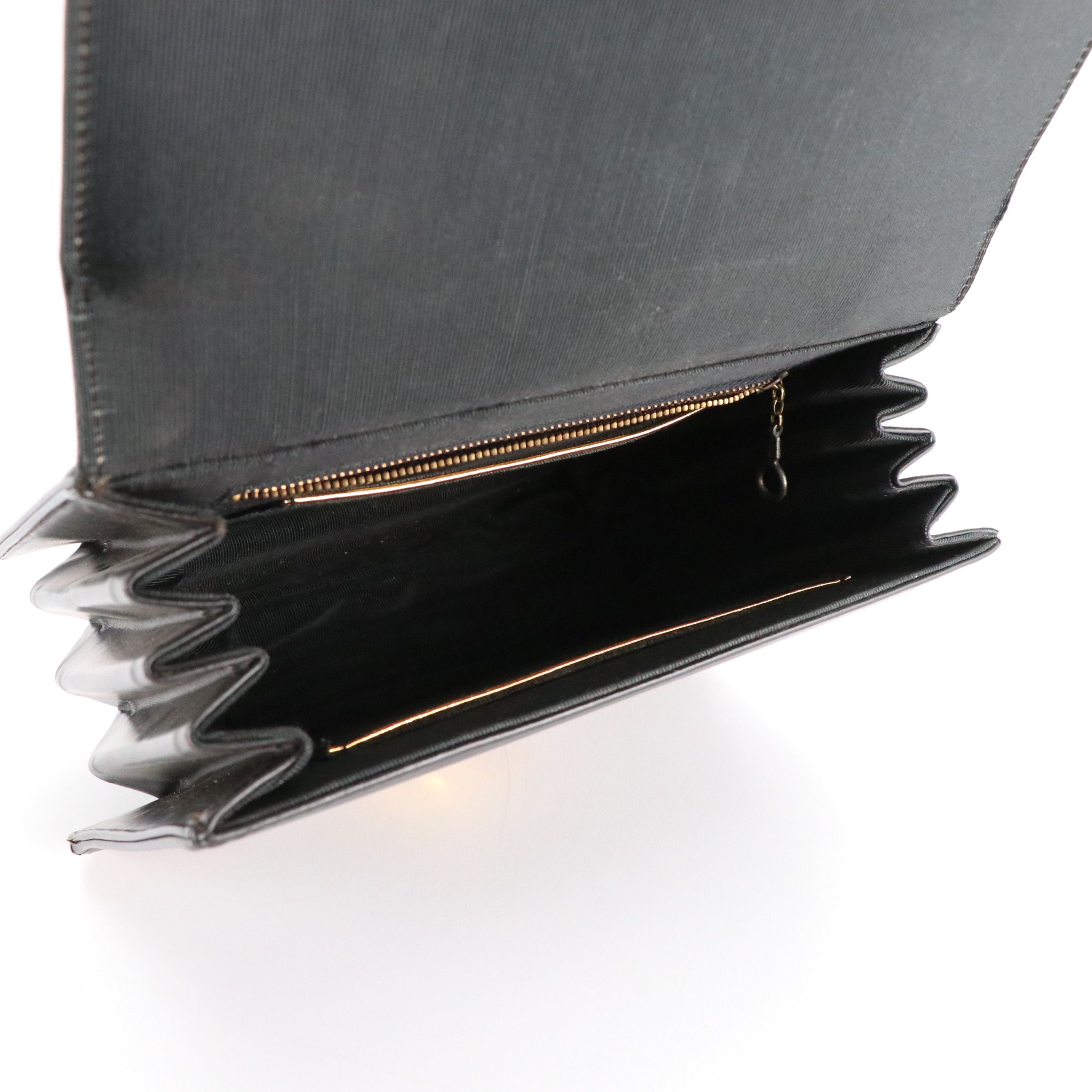 Palizzio Front Flap Accordion Top Handle Handbag in Black and Brown Leather