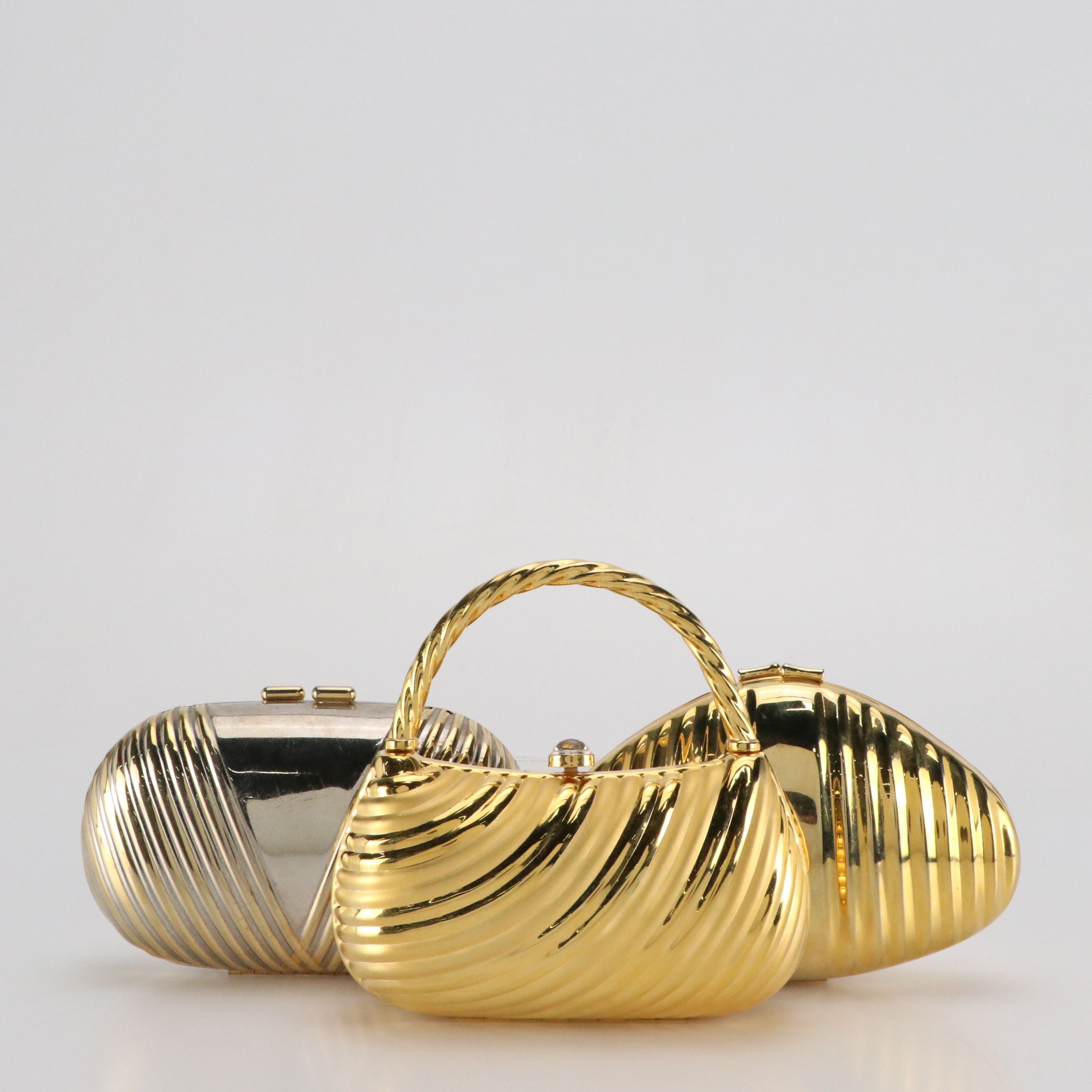 Daniella and Other Ribbed Hardshell Gold Tone Evening Bags