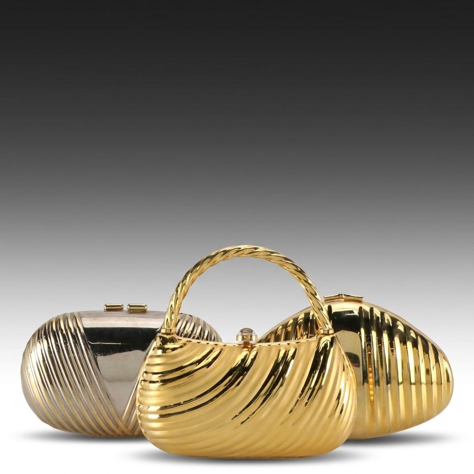 Daniella and Other Ribbed Hardshell Gold Tone Evening Bags