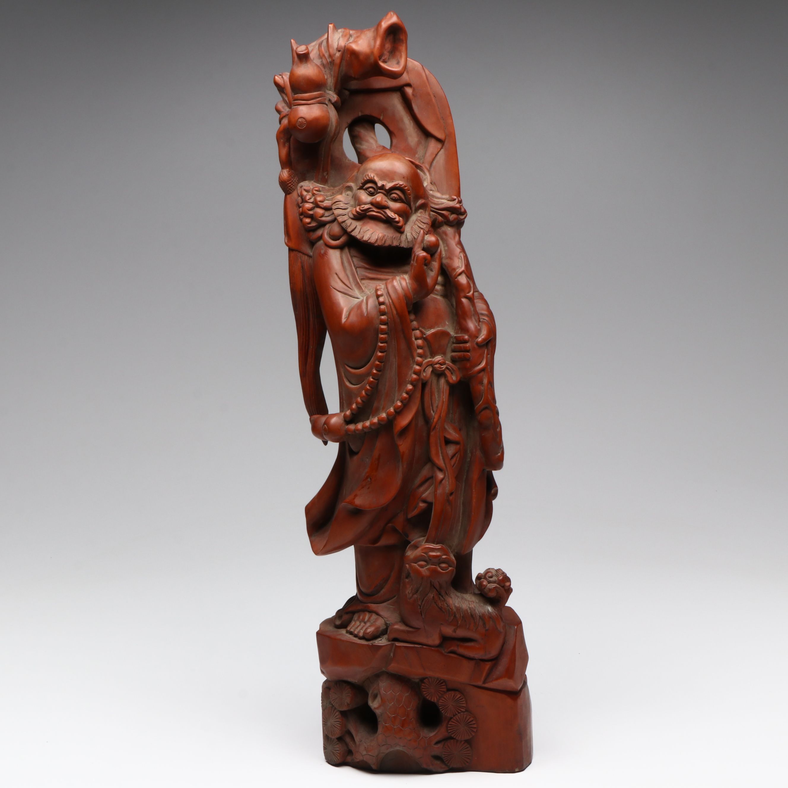 Chinese Carved Wood Deity with Guardian Lion