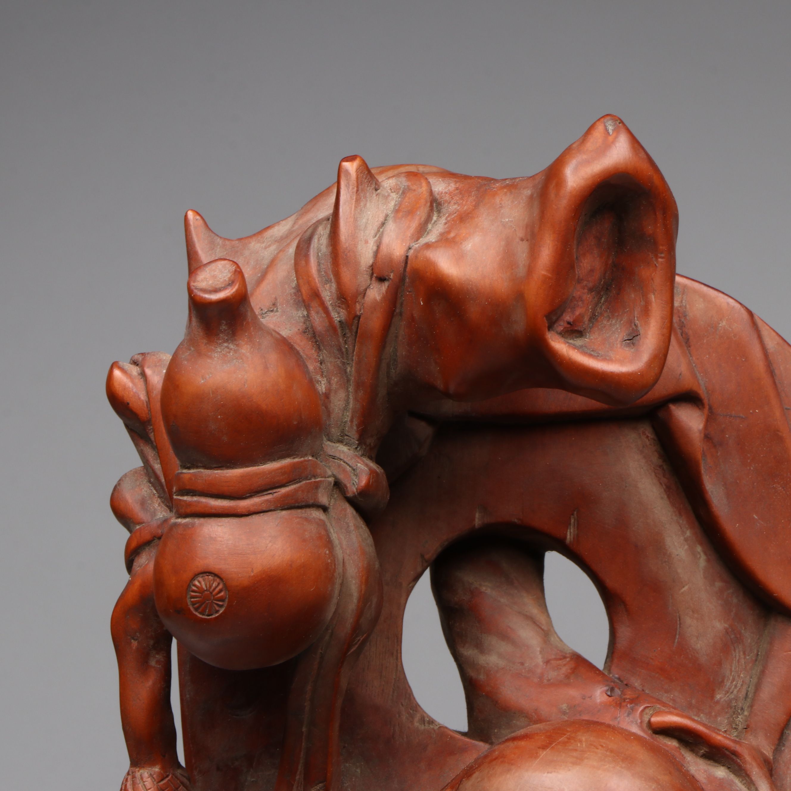 Chinese Carved Wood Deity with Guardian Lion