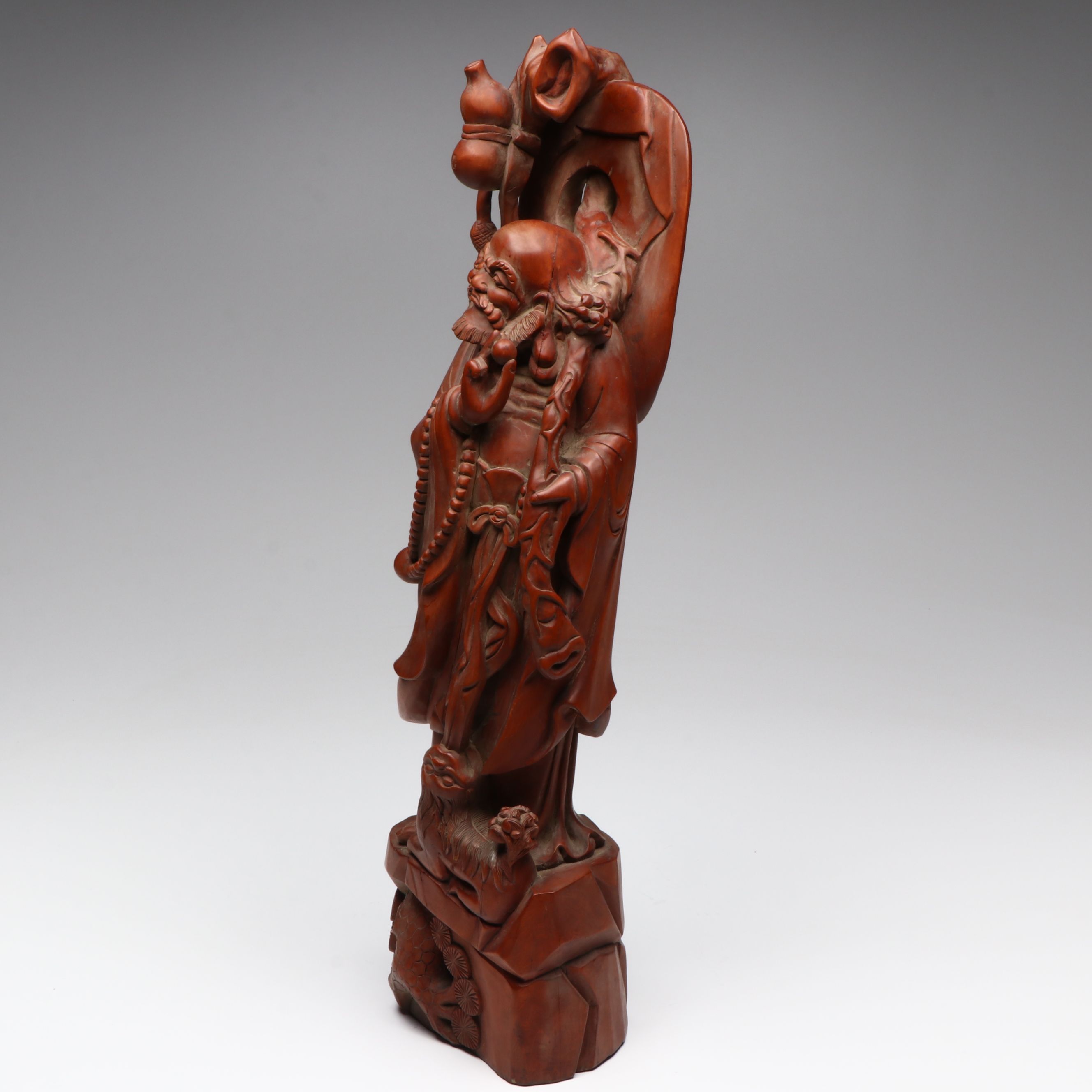 Chinese Carved Wood Deity with Guardian Lion