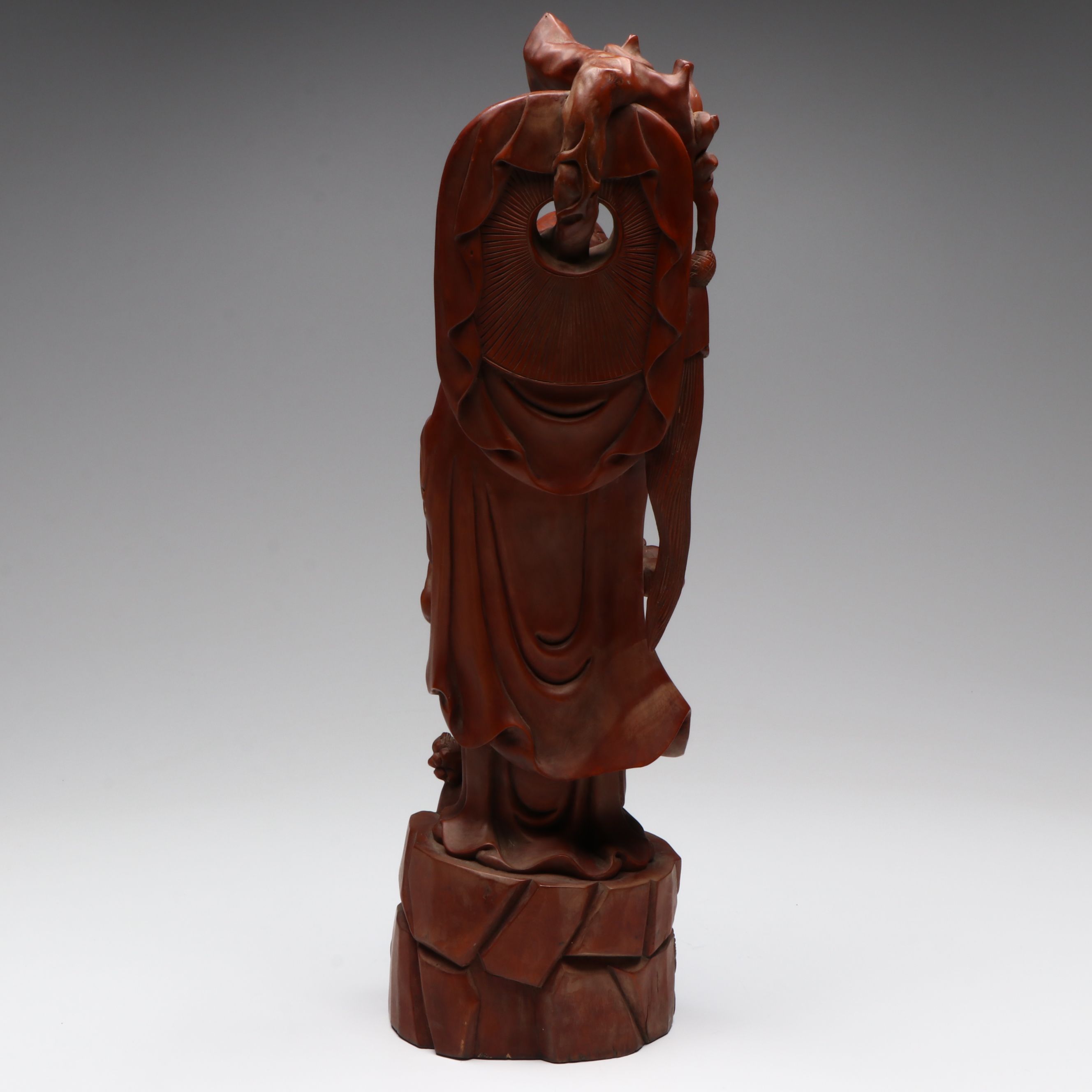 Chinese Carved Wood Deity with Guardian Lion