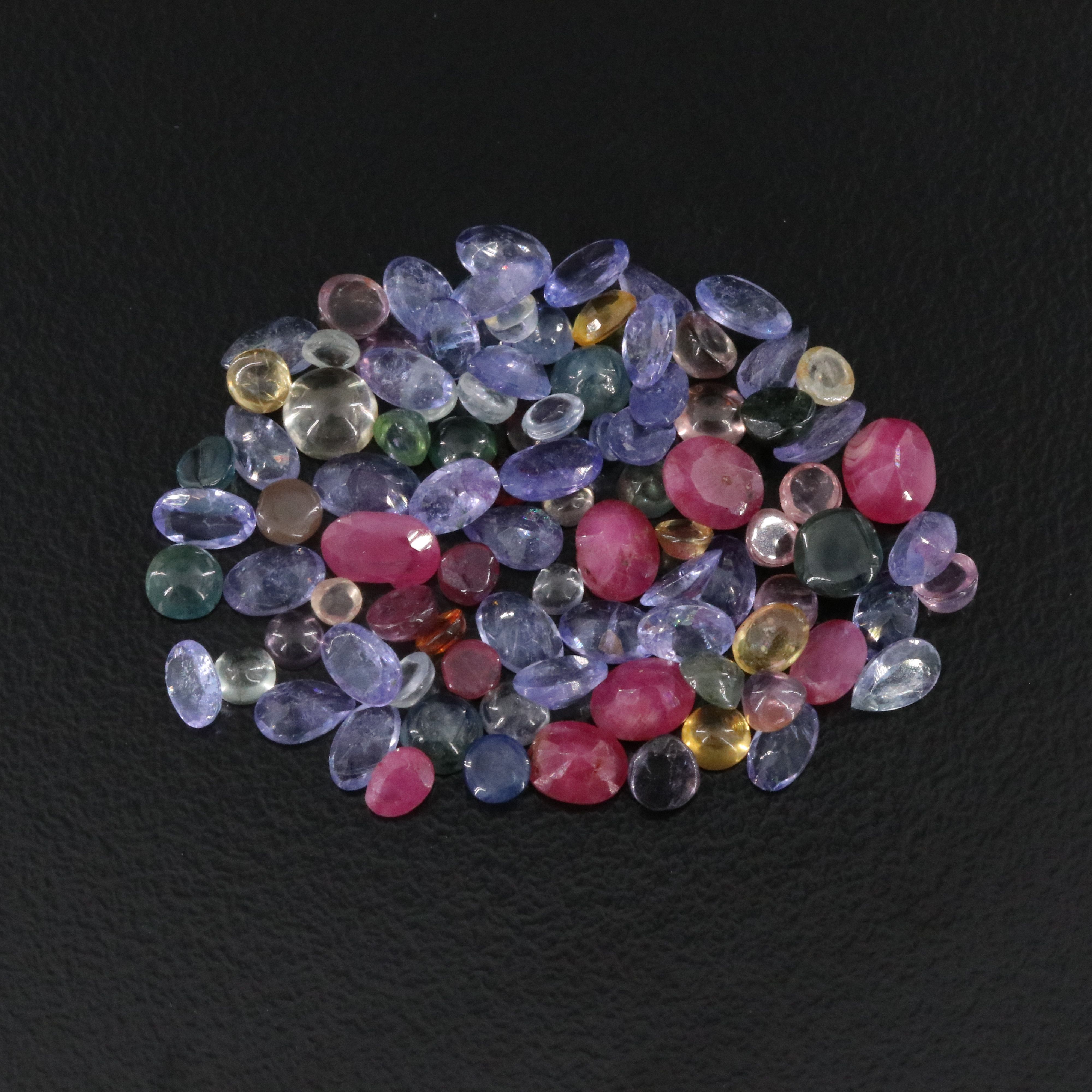 Loose 21.28 CTW Gemstone Lot Including Tanzanite, Ruby and Sapphire