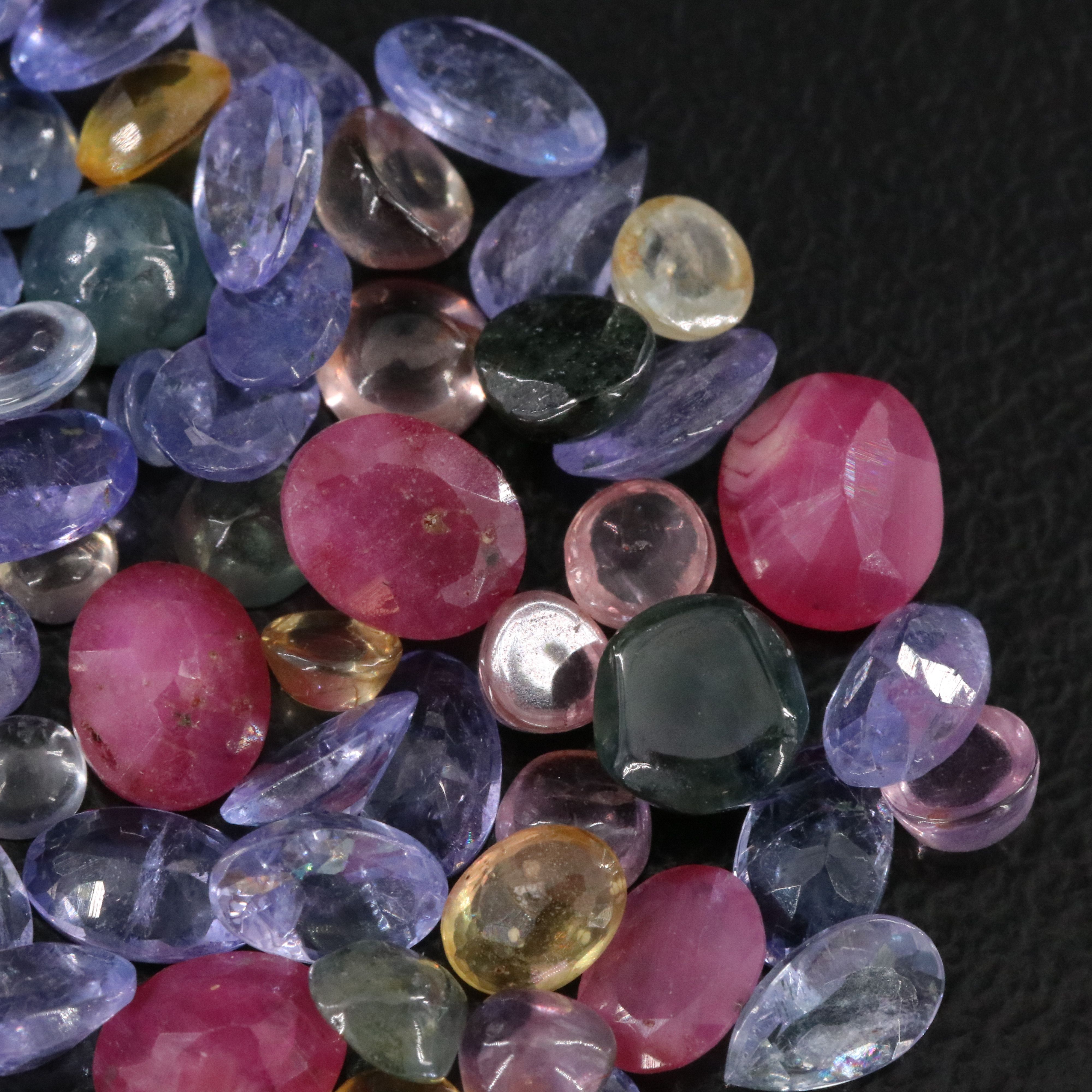 Loose 21.28 CTW Gemstone Lot Including Tanzanite, Ruby and Sapphire