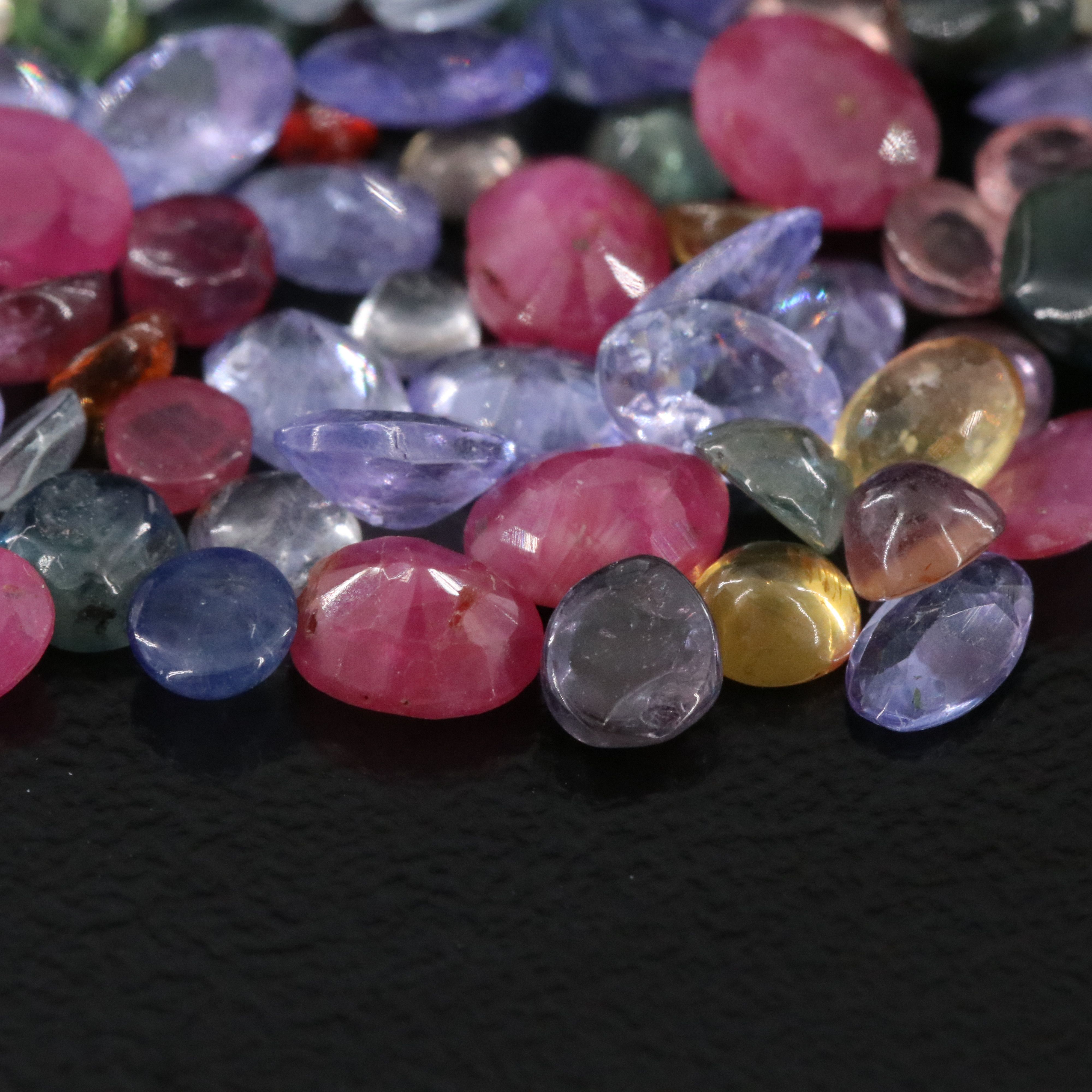 Loose 21.28 CTW Gemstone Lot Including Tanzanite, Ruby and Sapphire