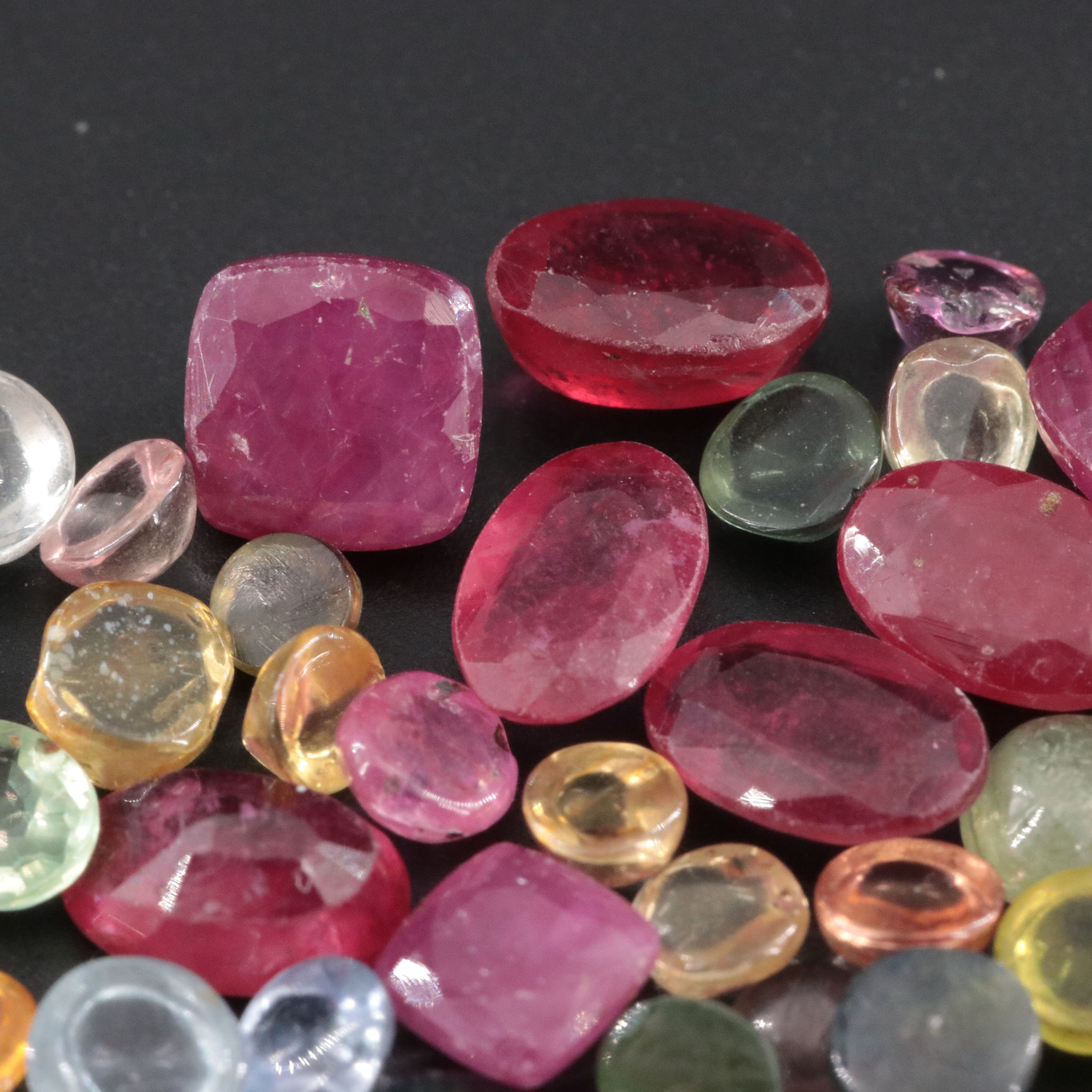 Loose 22.92 CTW Gemstone Lot Including Filled Corundum, Sapphire and Ruby