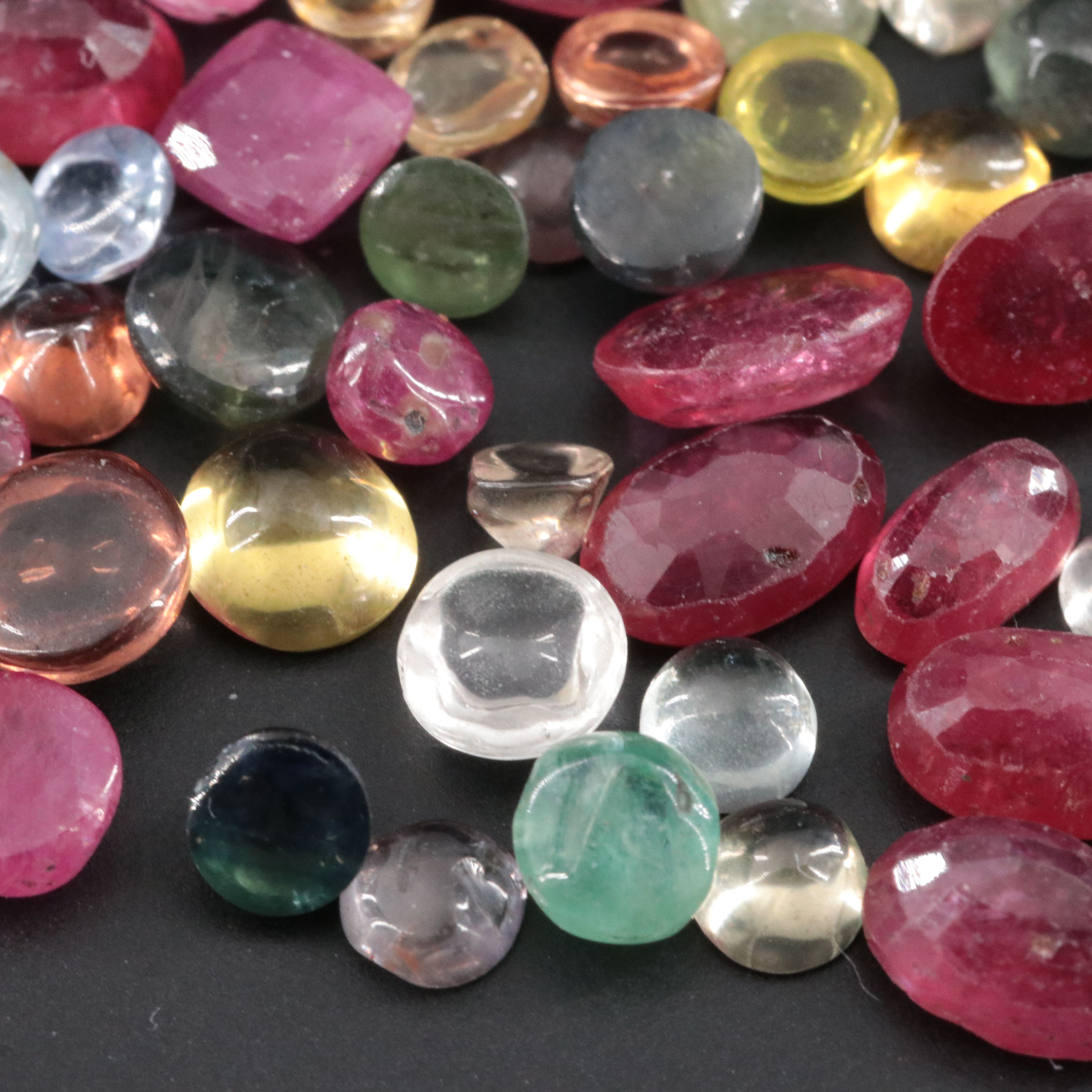 Loose 22.92 CTW Gemstone Lot Including Filled Corundum, Sapphire and Ruby