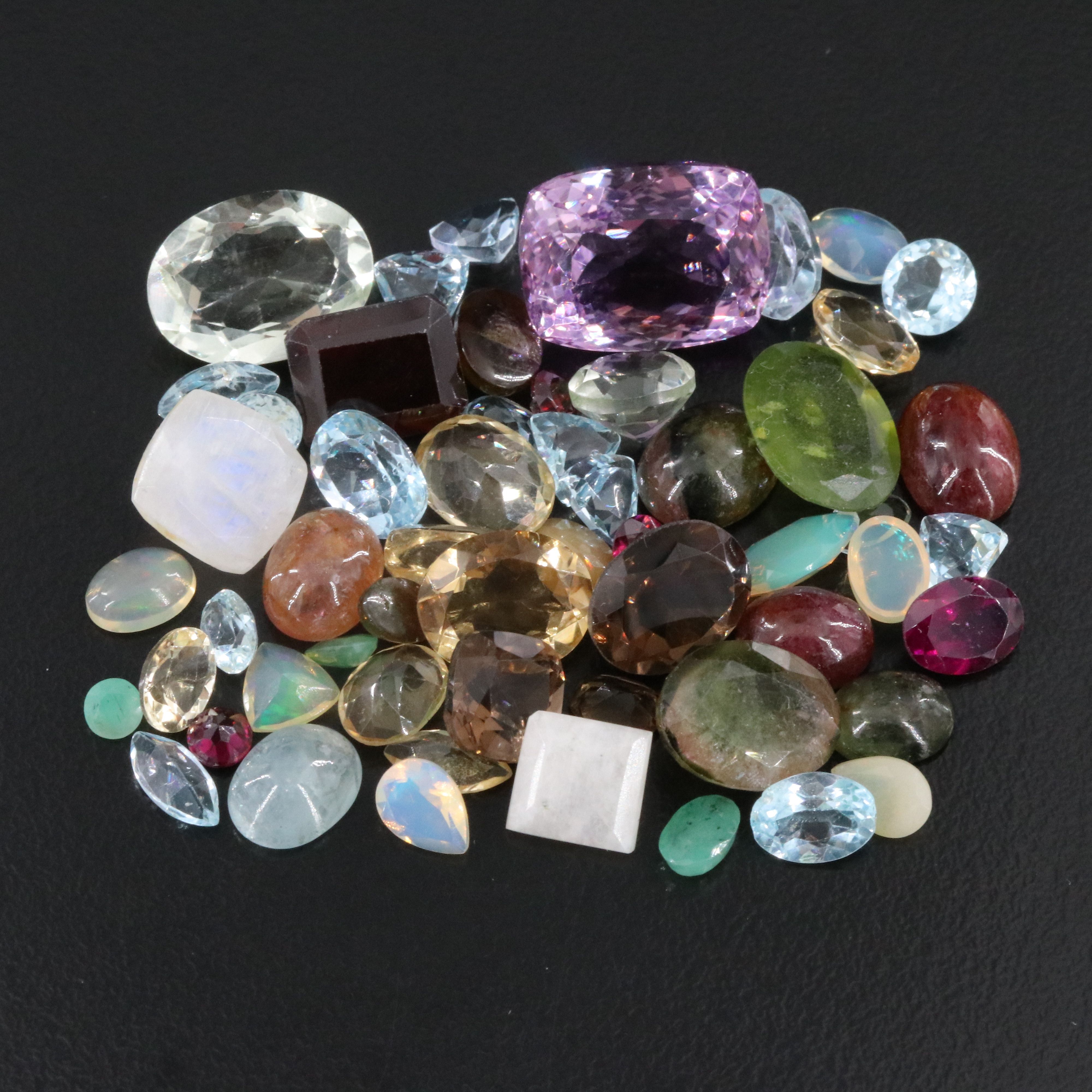 Loose 95.36 CTW Gemstone Lot with Rainbow Moonstone, Amethyst and Tourmaline
