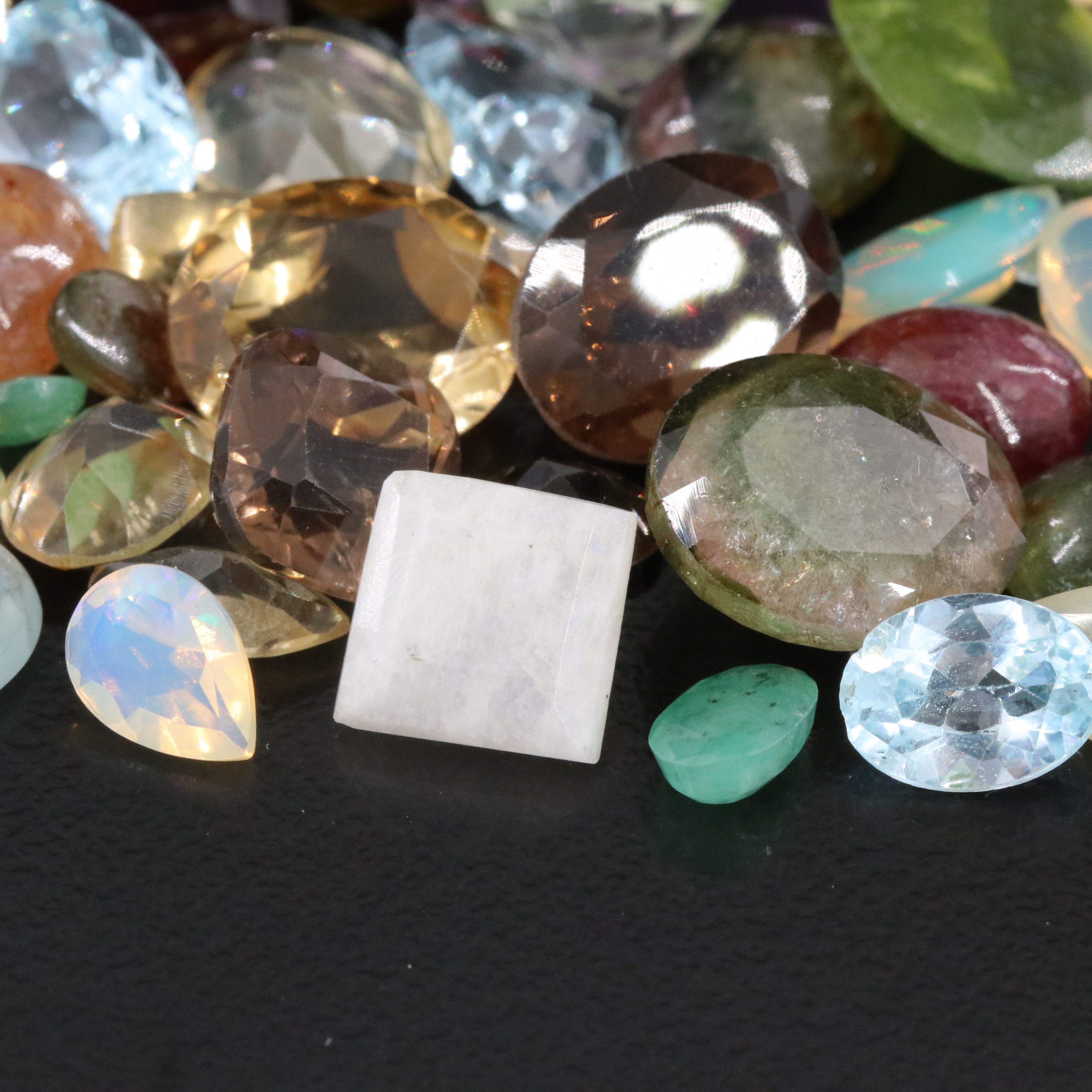 Loose 95.36 CTW Gemstone Lot with Rainbow Moonstone, Amethyst and Tourmaline