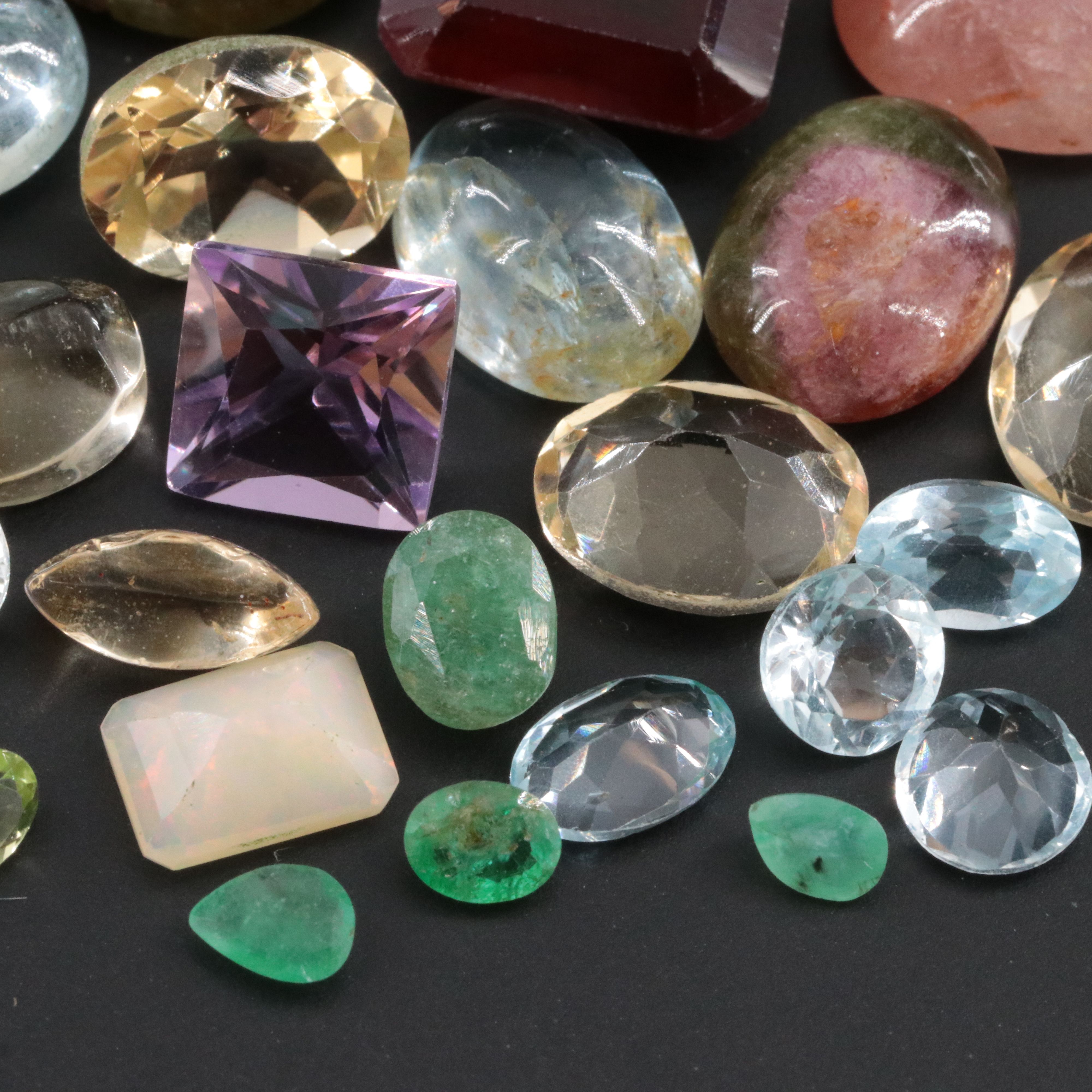 Loose 99.72 CTW Gemstone Lot Including Citrine, Amethyst and Hessonite