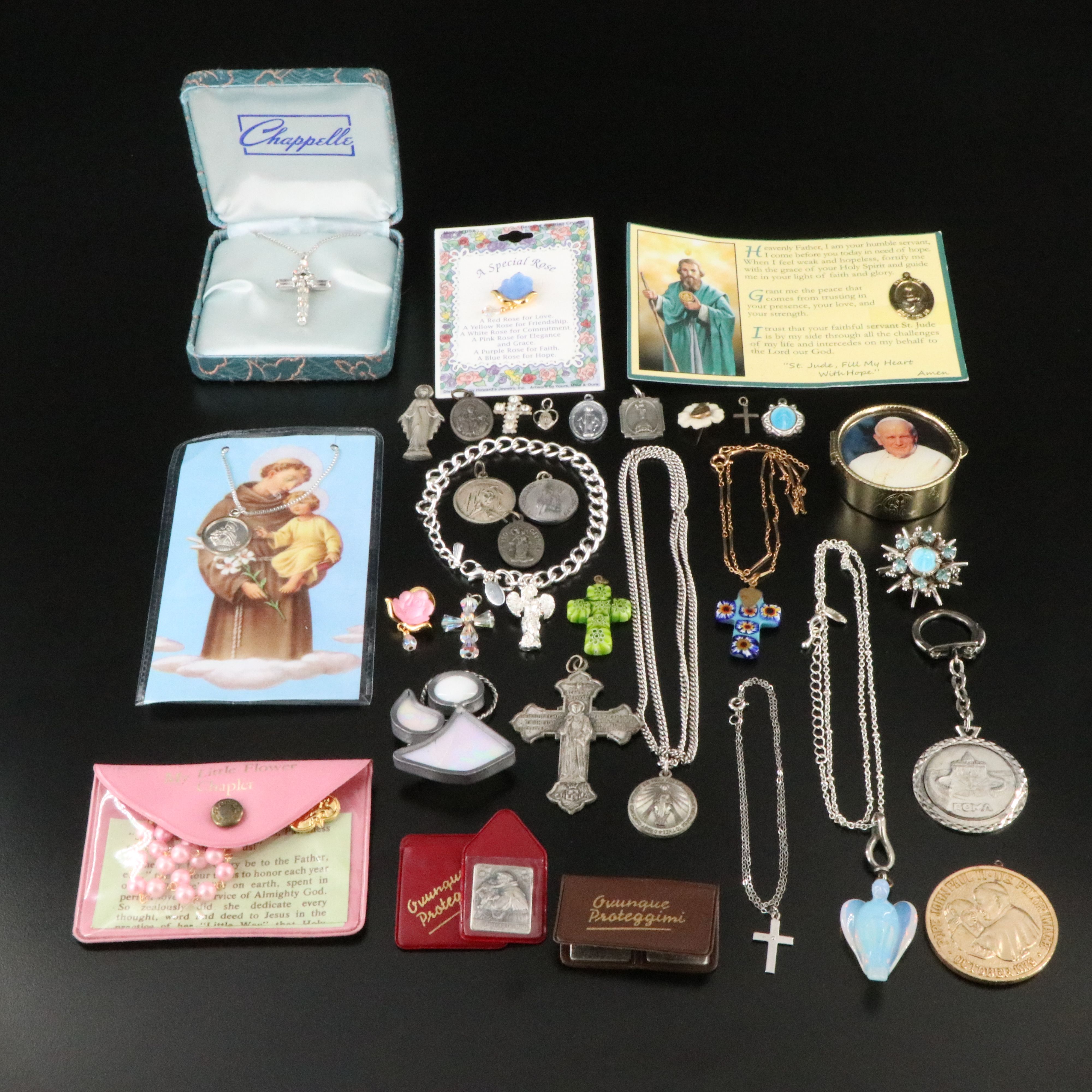 Sterling, Opalescent Glass and Crystal Featured in Ecclesiastical Jewelry