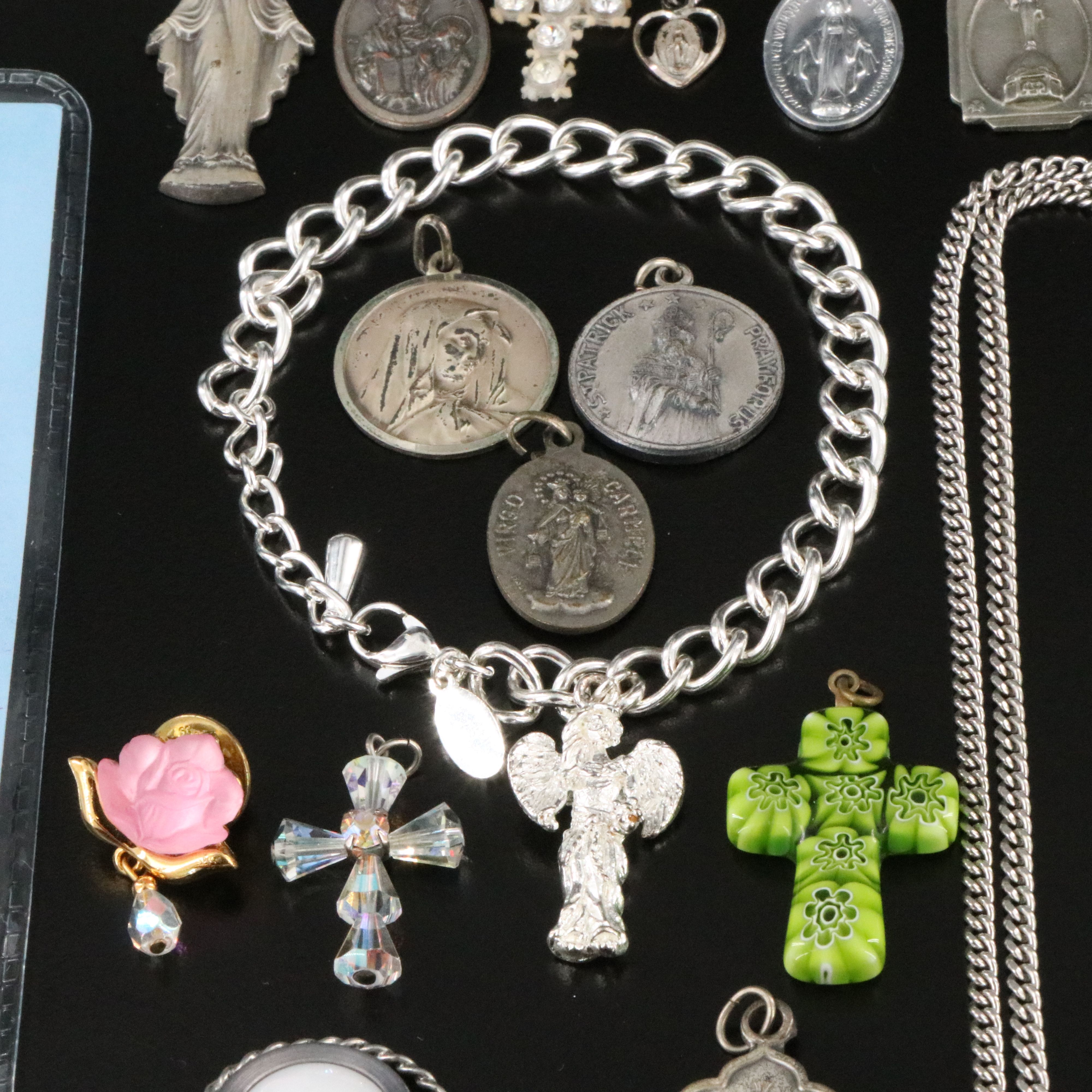 Sterling, Opalescent Glass and Crystal Featured in Ecclesiastical Jewelry