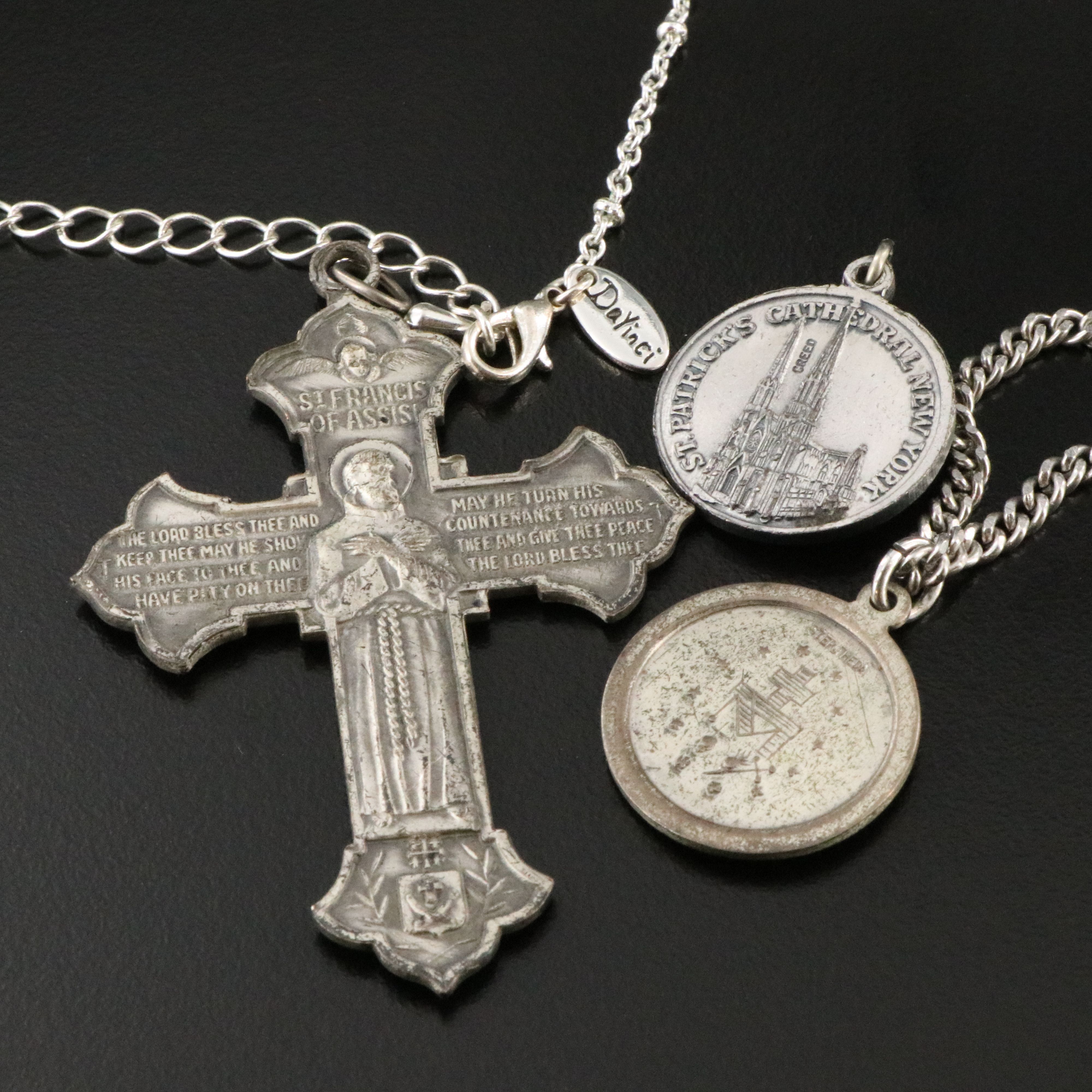 Sterling, Opalescent Glass and Crystal Featured in Ecclesiastical Jewelry