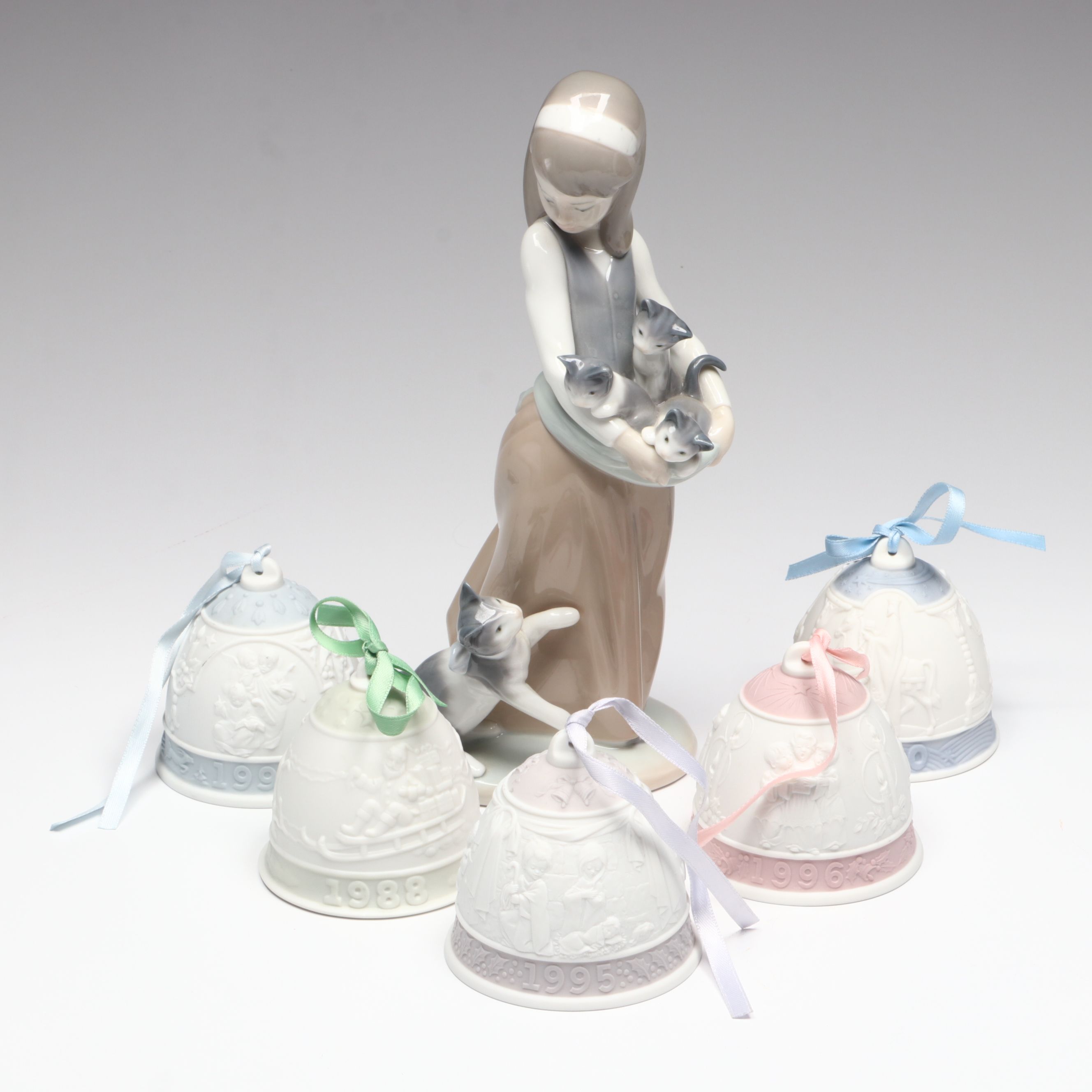 Lladró "Following Her Cats" Porcelain Figurine and Annual Porcelain Bells