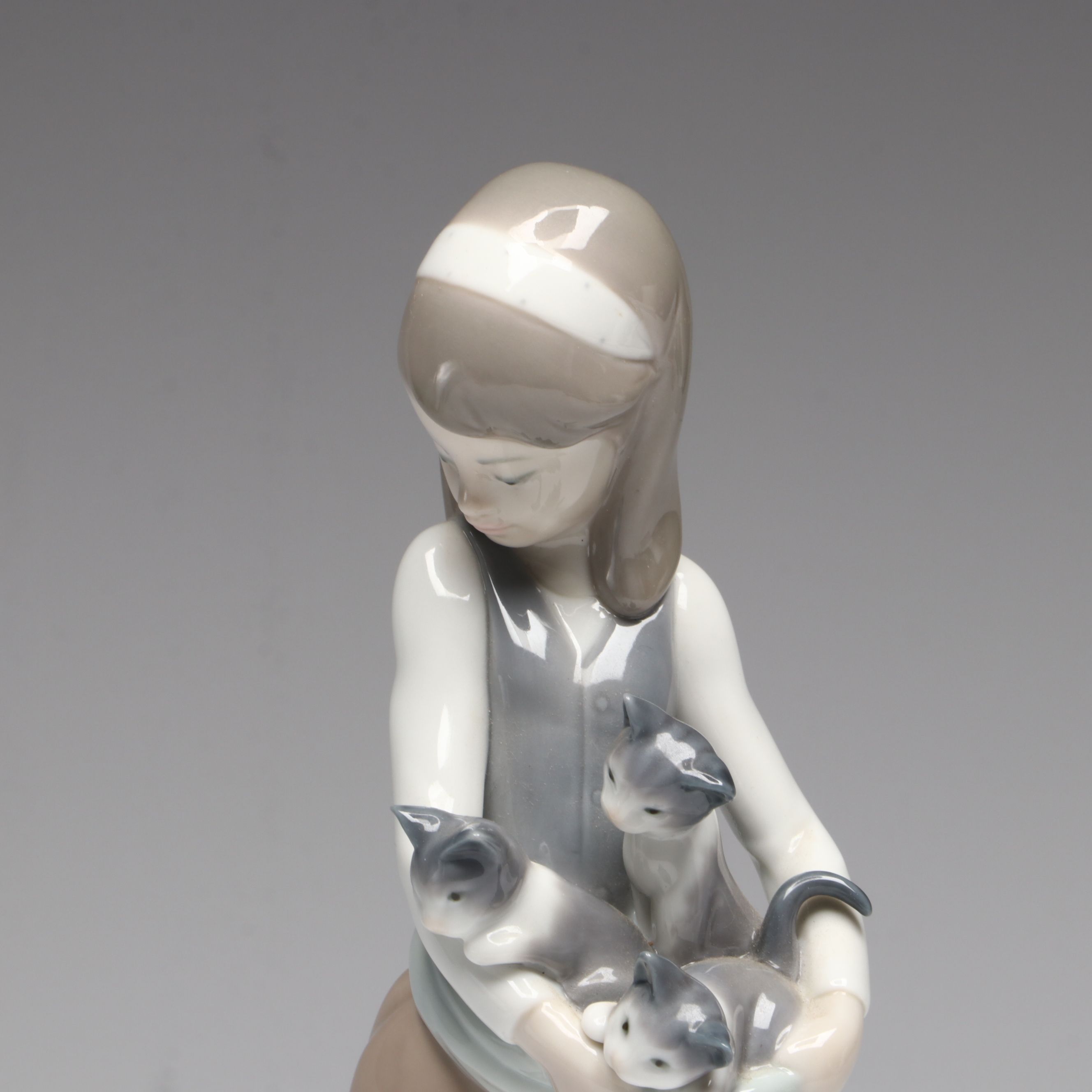 Lladró "Following Her Cats" Porcelain Figurine and Annual Porcelain Bells